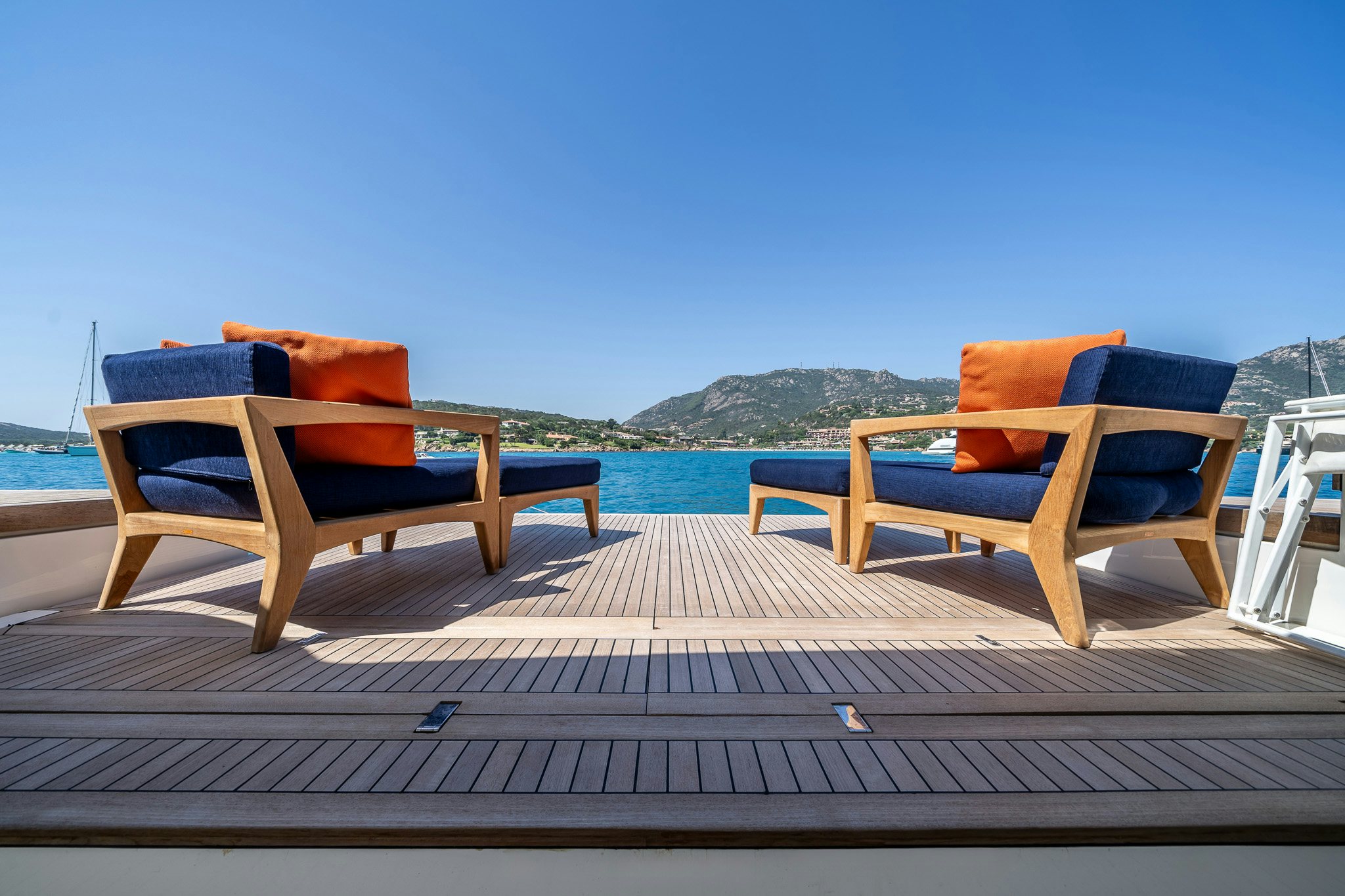a couple of chairs on a deck aboard BLUE ANGEL Yacht for Sale