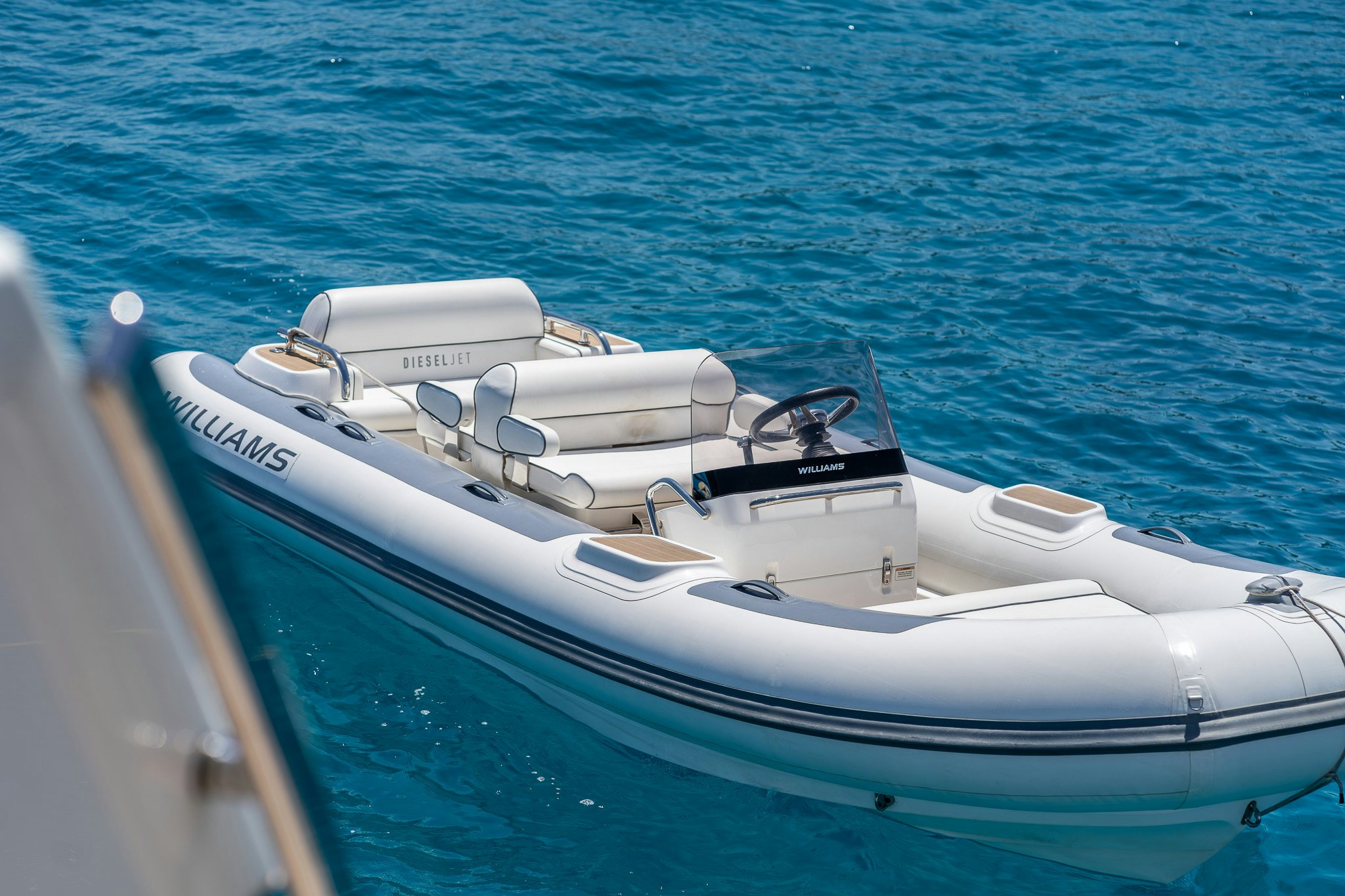 a white boat on the water aboard BLUE ANGEL Yacht for Sale