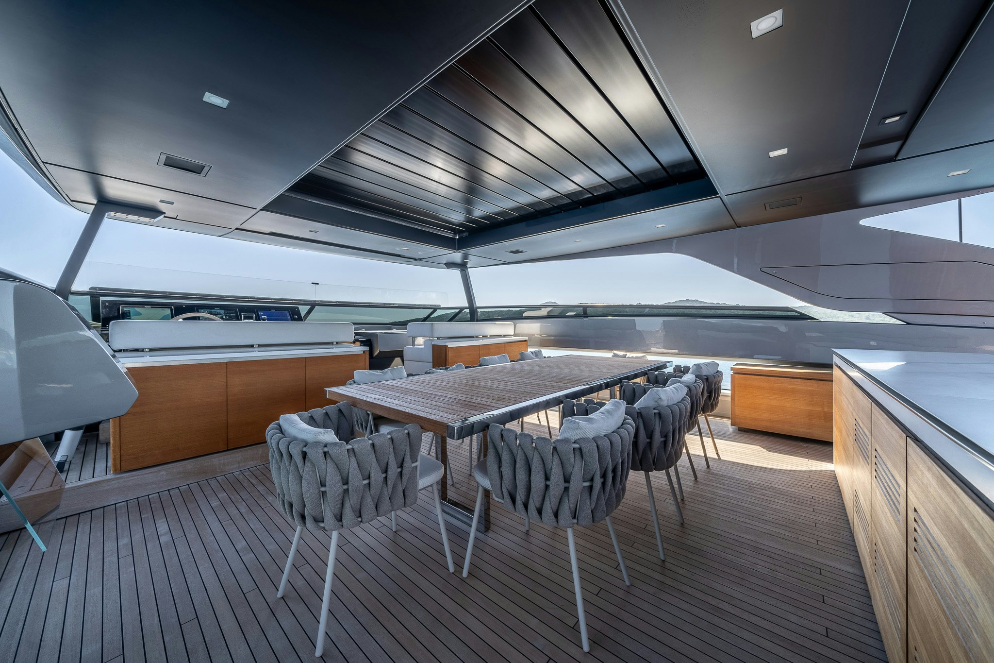 a room with a table and chairs aboard BLUE ANGEL Yacht for Sale