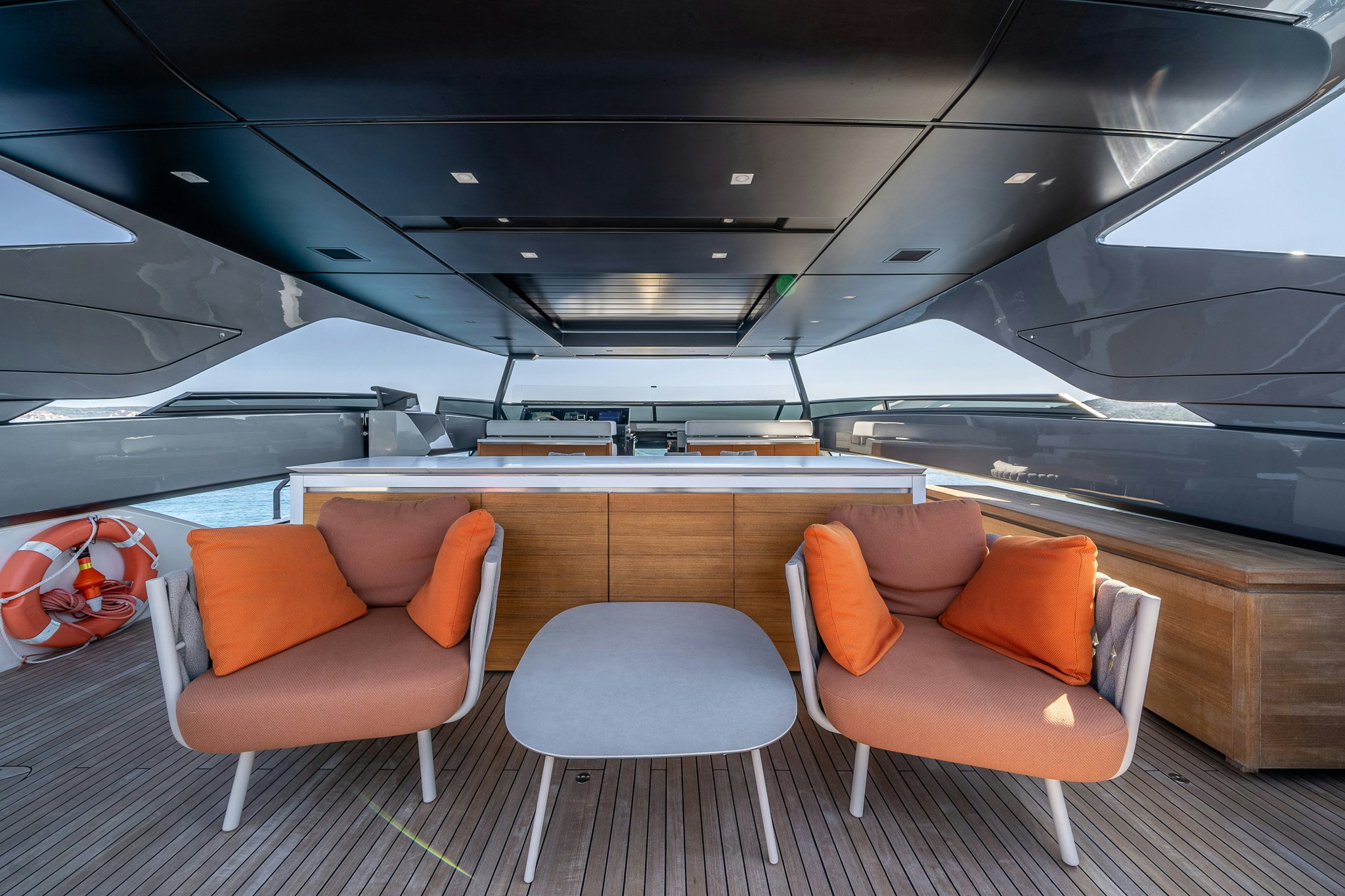 a room with chairs and a table aboard BLUE ANGEL Yacht for Sale