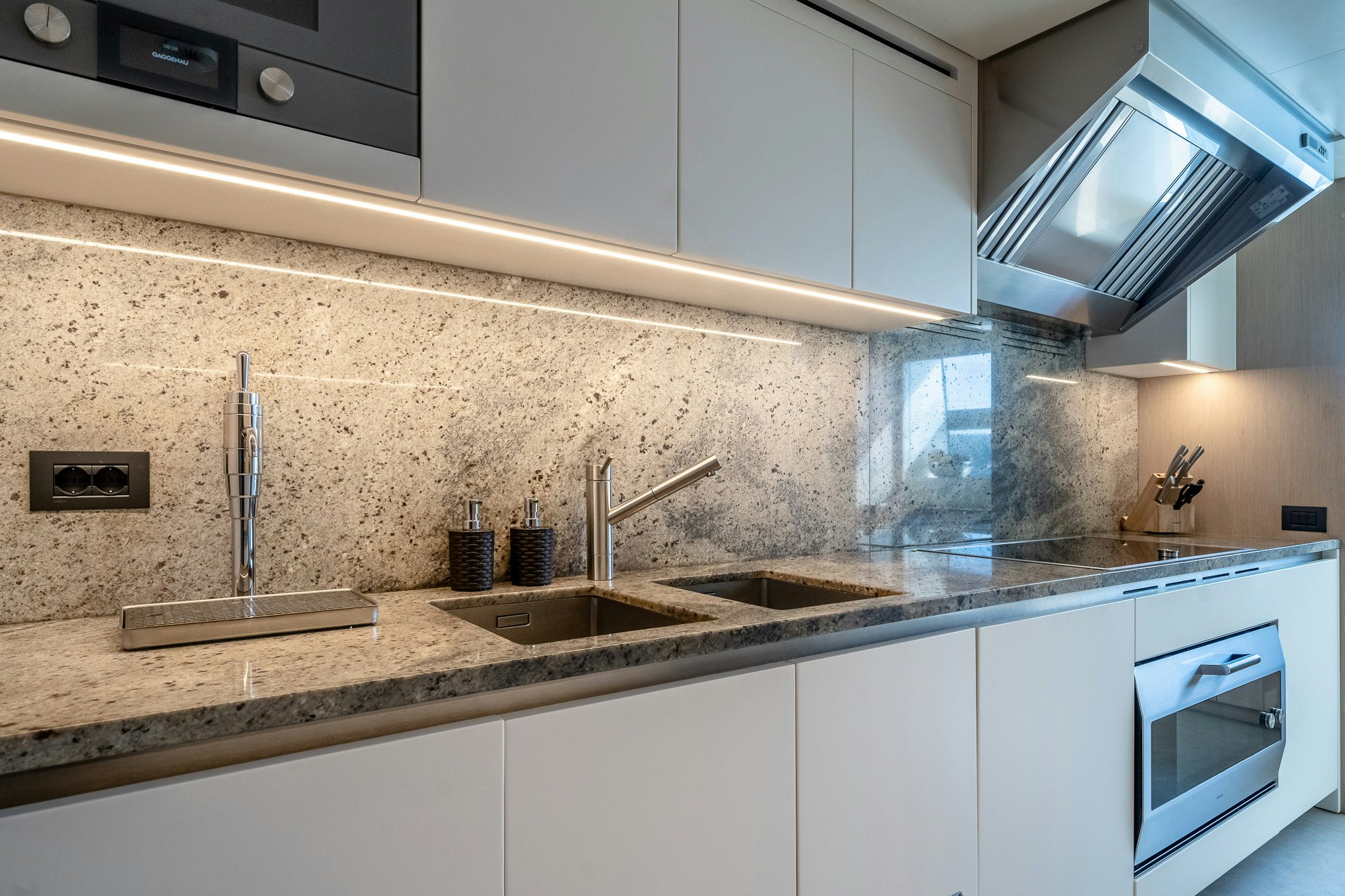 a kitchen with a sink and a faucet aboard BLUE ANGEL Yacht for Sale