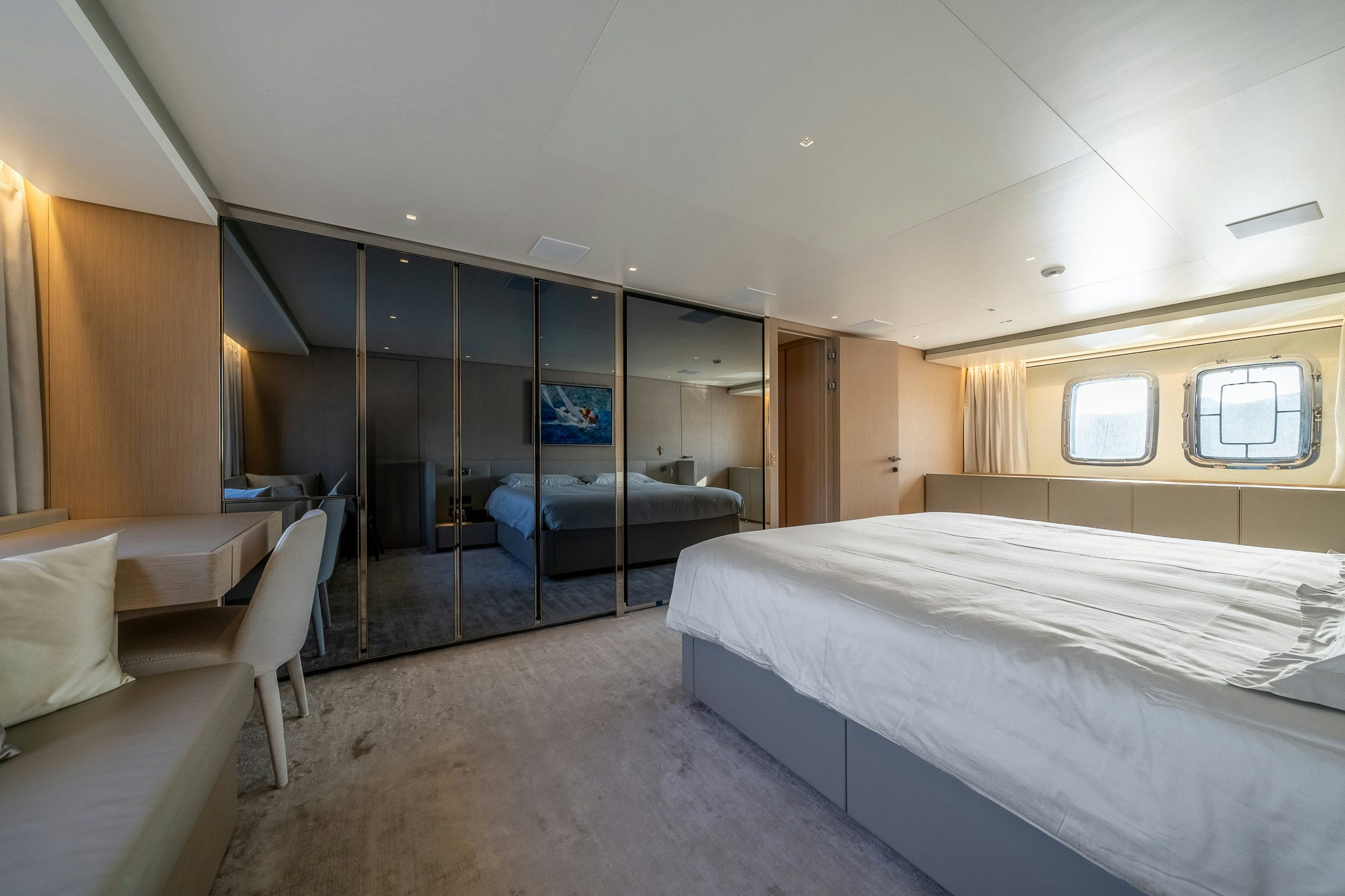 a room with beds and a window aboard BLUE ANGEL Yacht for Sale