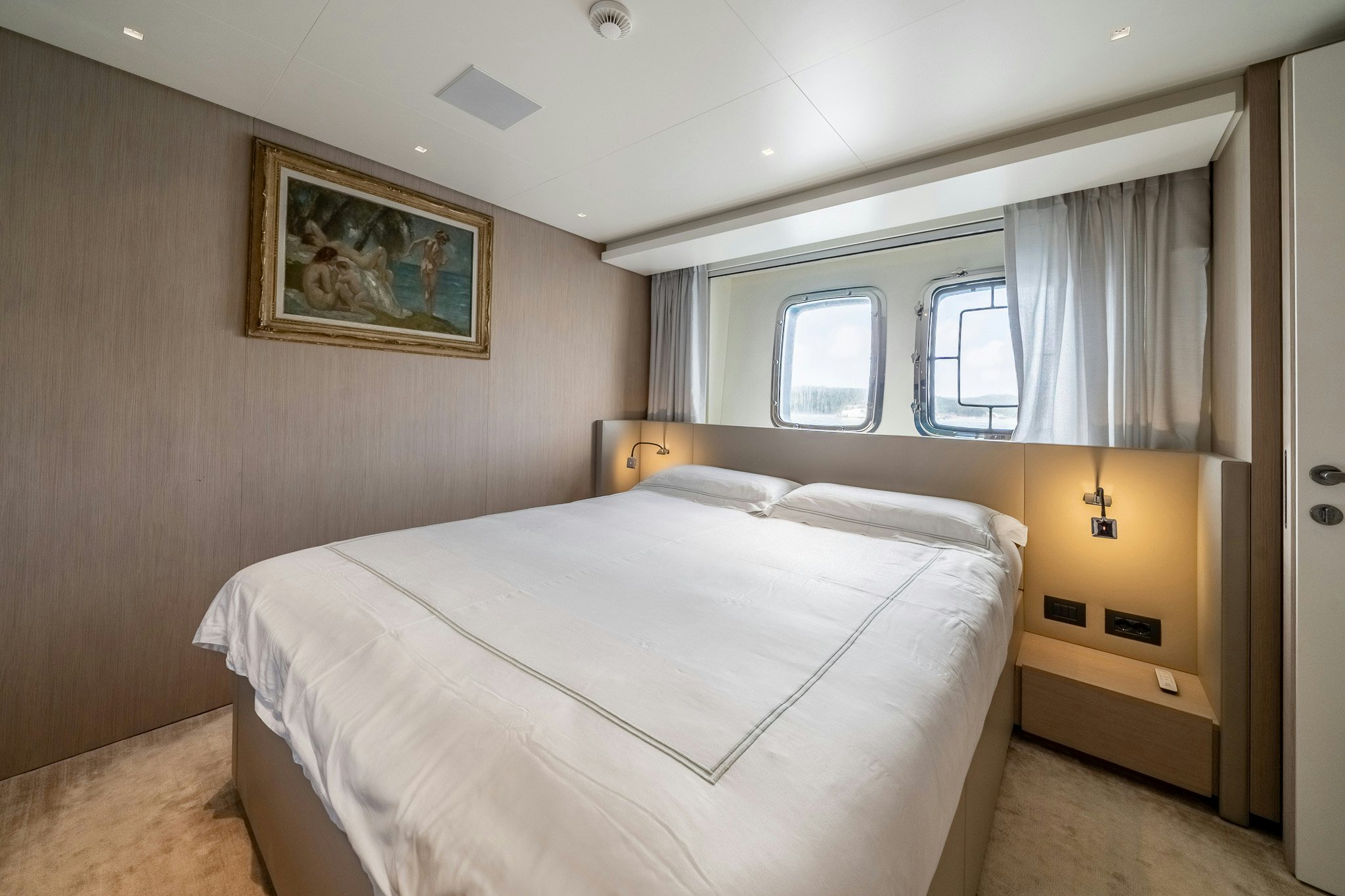a bedroom with a bed aboard BLUE ANGEL Yacht for Sale