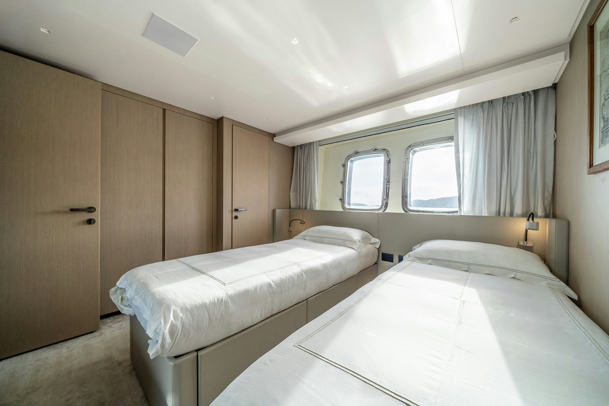 a couple of beds in a room aboard BLUE ANGEL Yacht for Sale