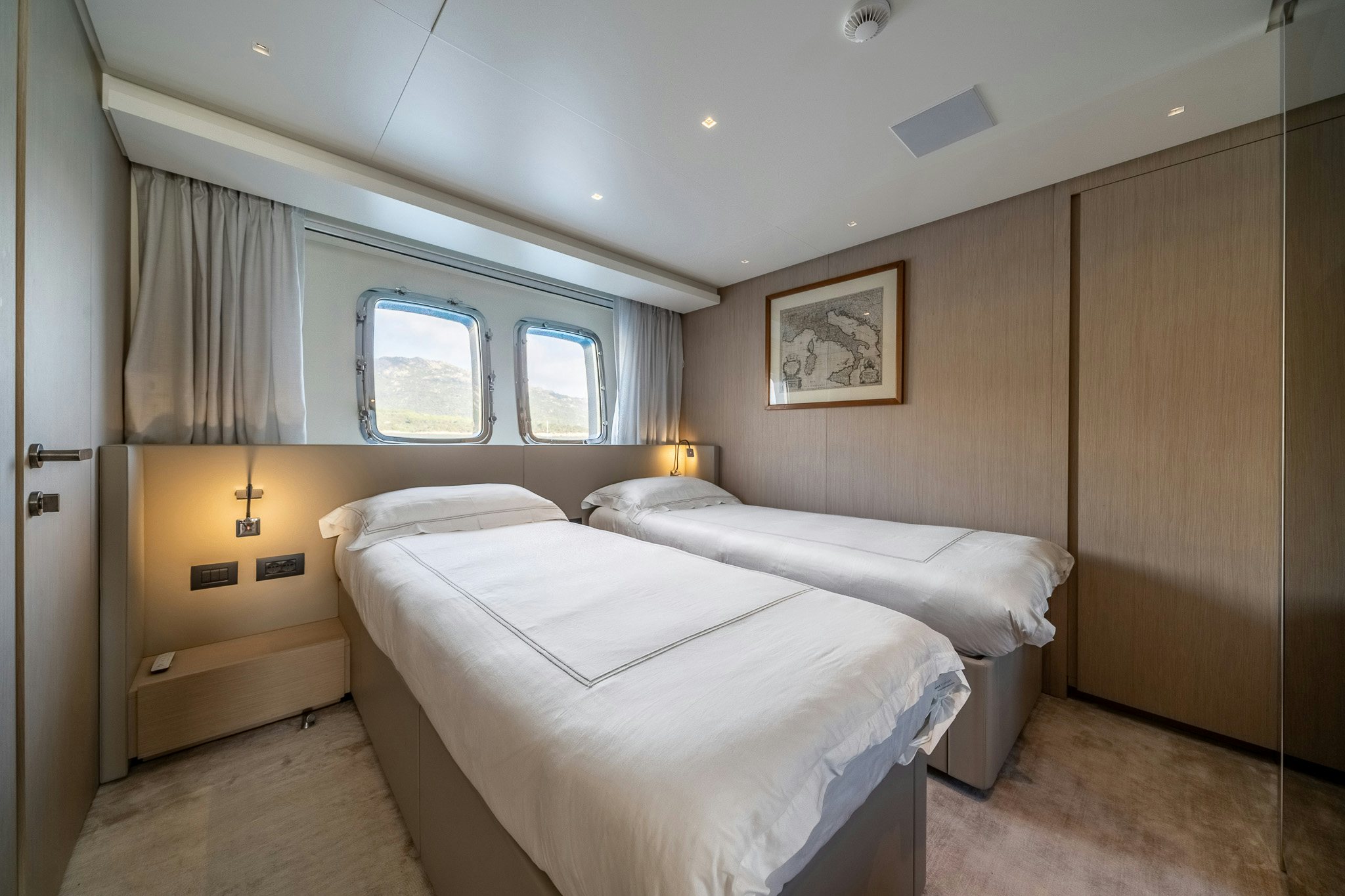a room with two beds aboard BLUE ANGEL Yacht for Sale