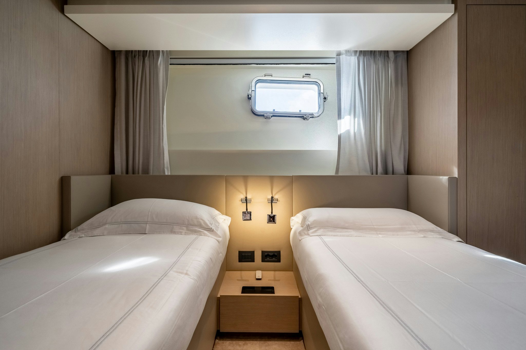 a room with two beds aboard BLUE ANGEL Yacht for Sale