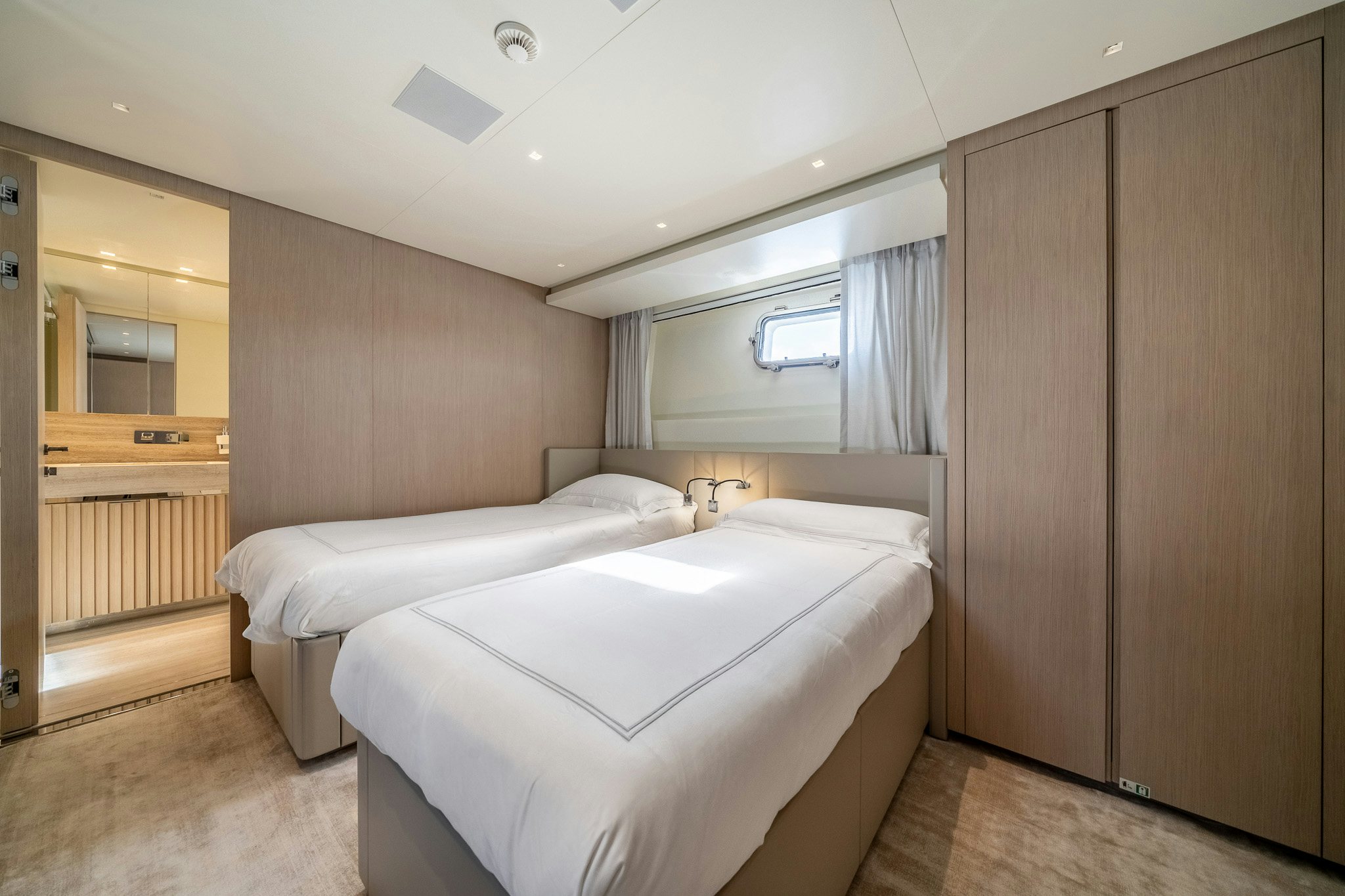 a room with two beds aboard BLUE ANGEL Yacht for Sale