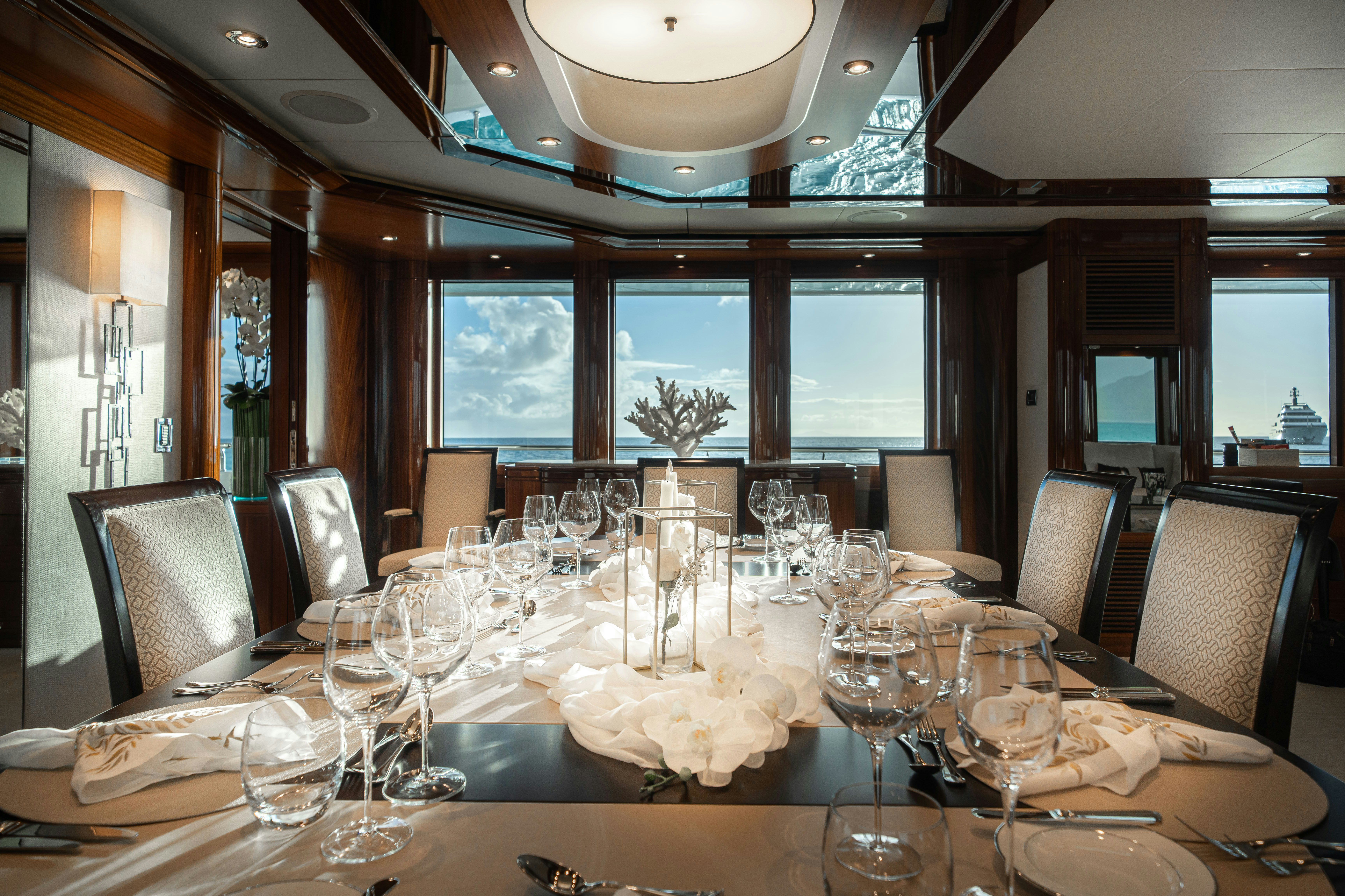 a table set for a dinner aboard CHASING DAYLIGHT Yacht for Charter