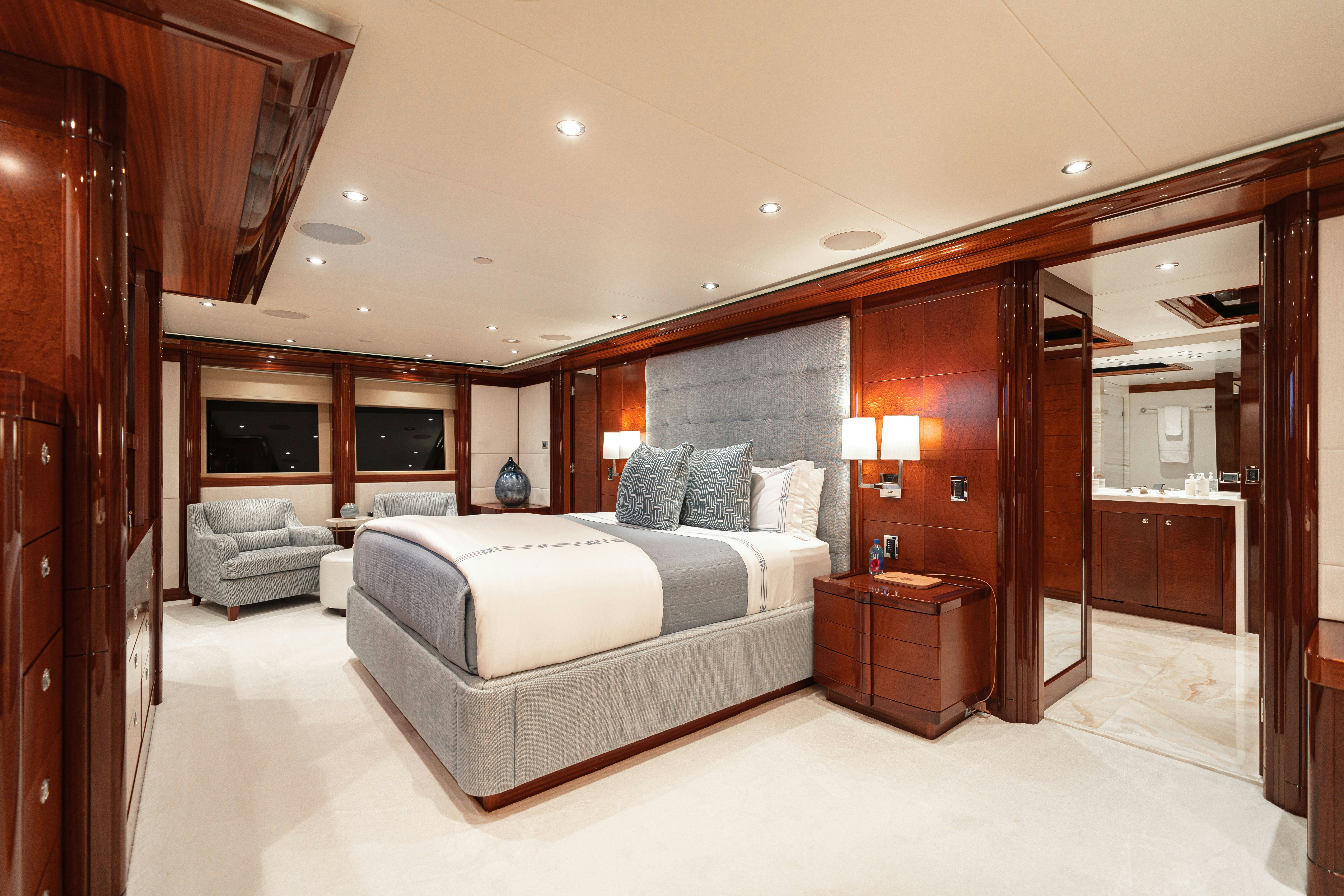 a large bedroom with a bed aboard CHASING DAYLIGHT Yacht for Charter
