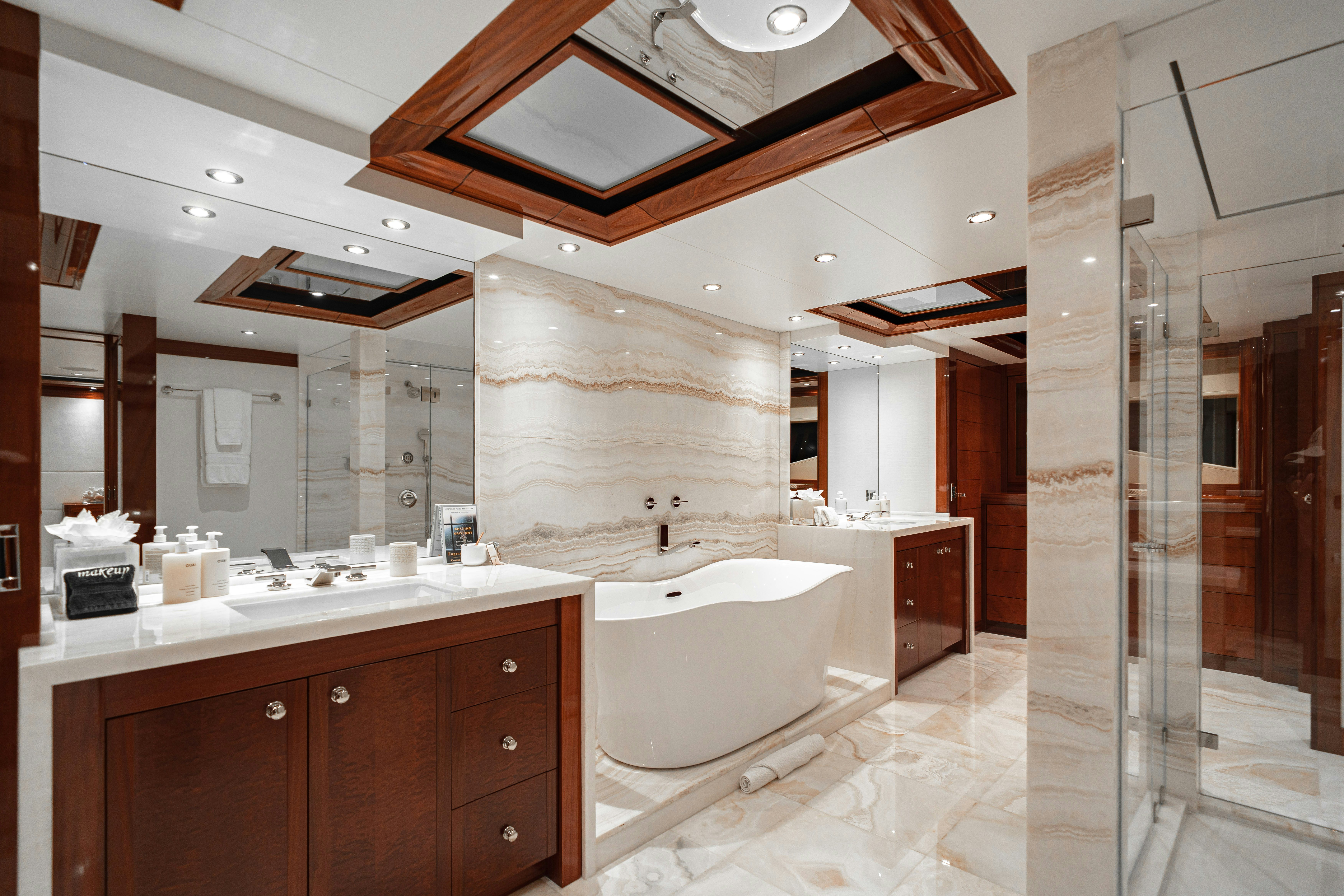 a bathroom with a large tub aboard CHASING DAYLIGHT Yacht for Charter