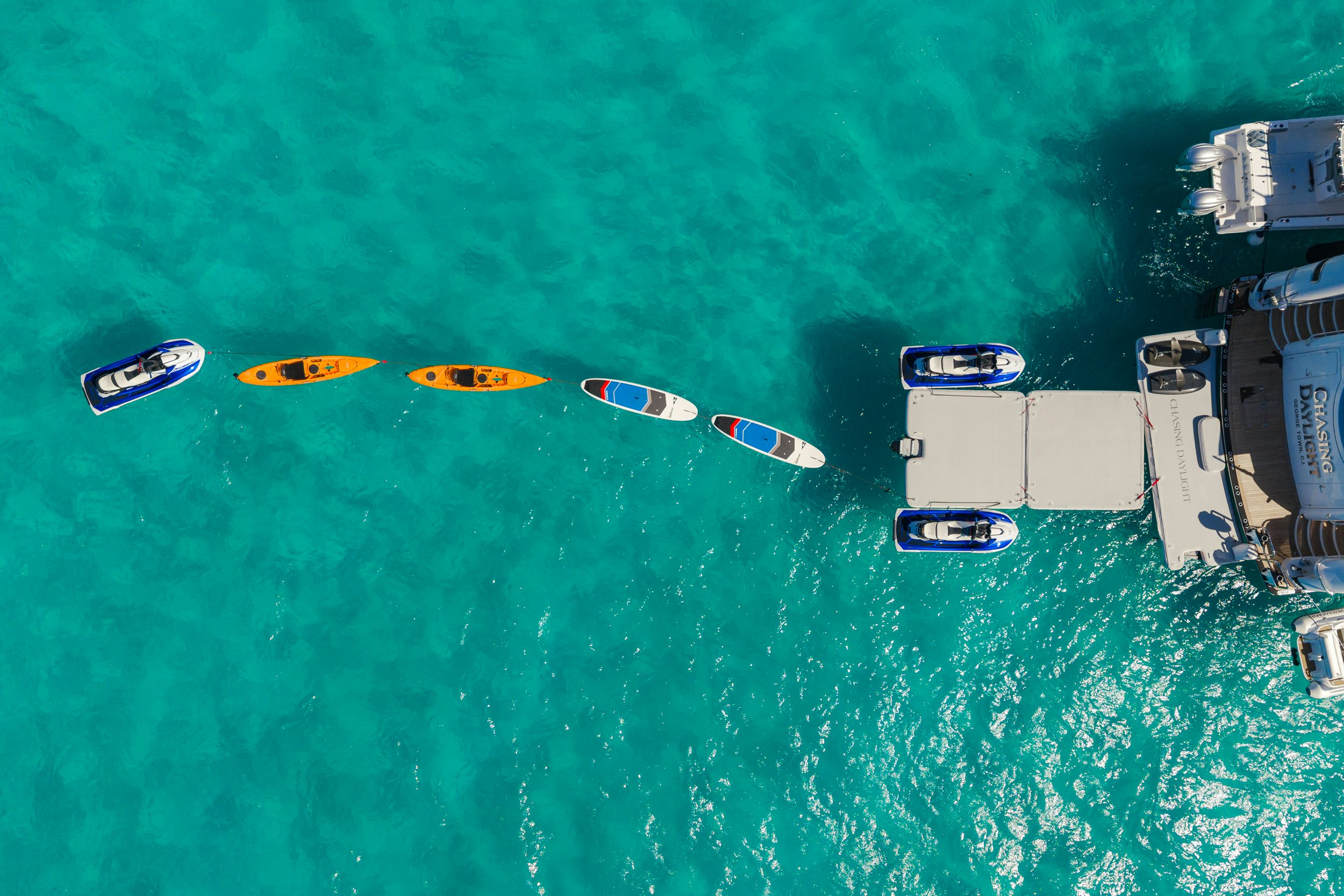 a video game with a large green screen aboard CHASING DAYLIGHT Yacht for Charter
