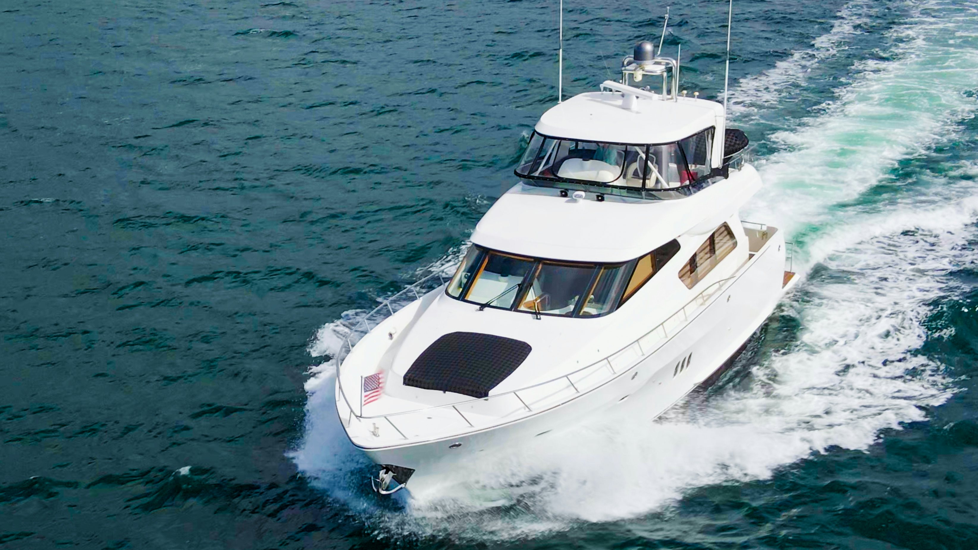 a boat on the water aboard YOLO Yacht for Sale