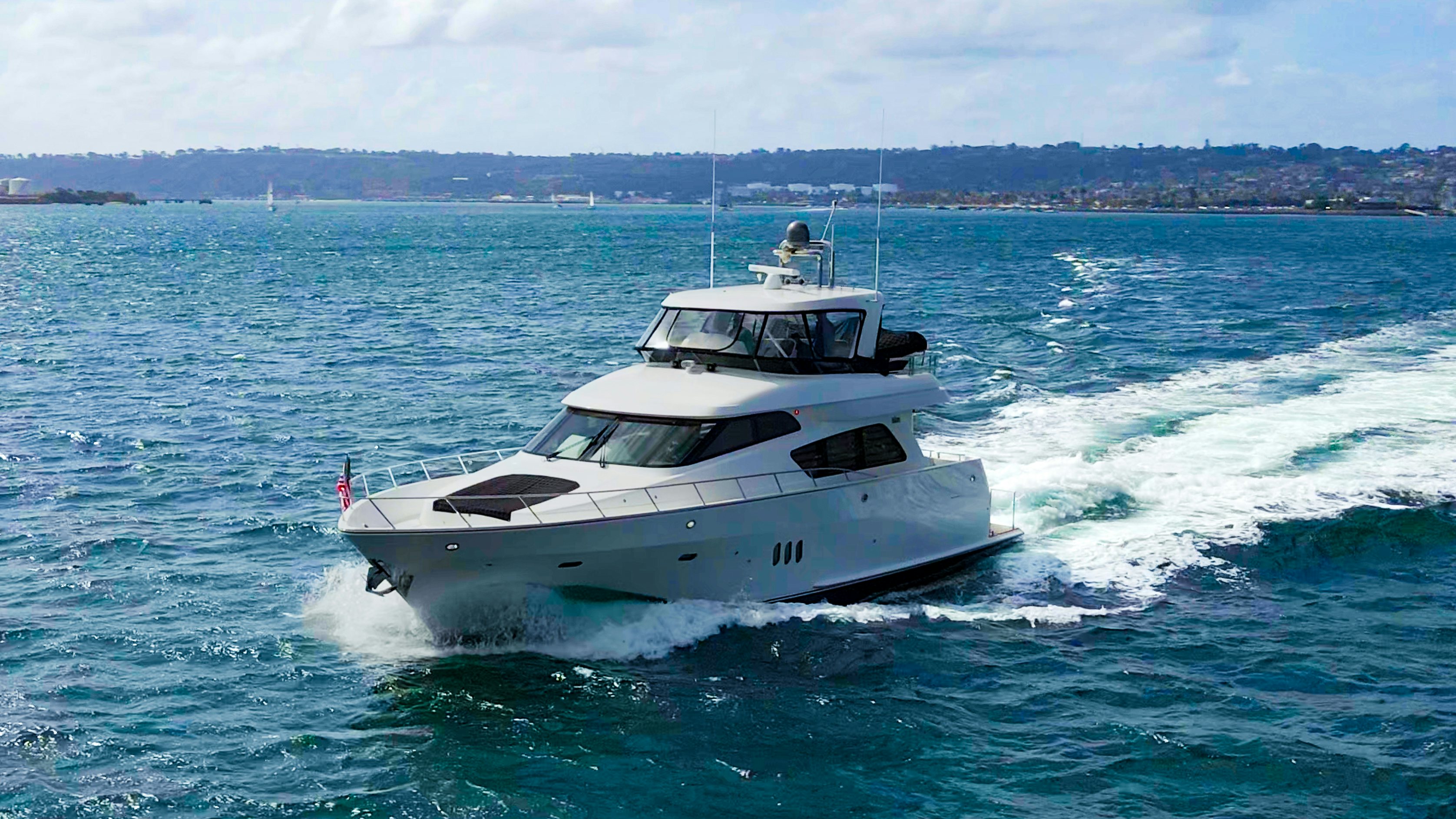 a boat on the water aboard YOLO Yacht for Sale