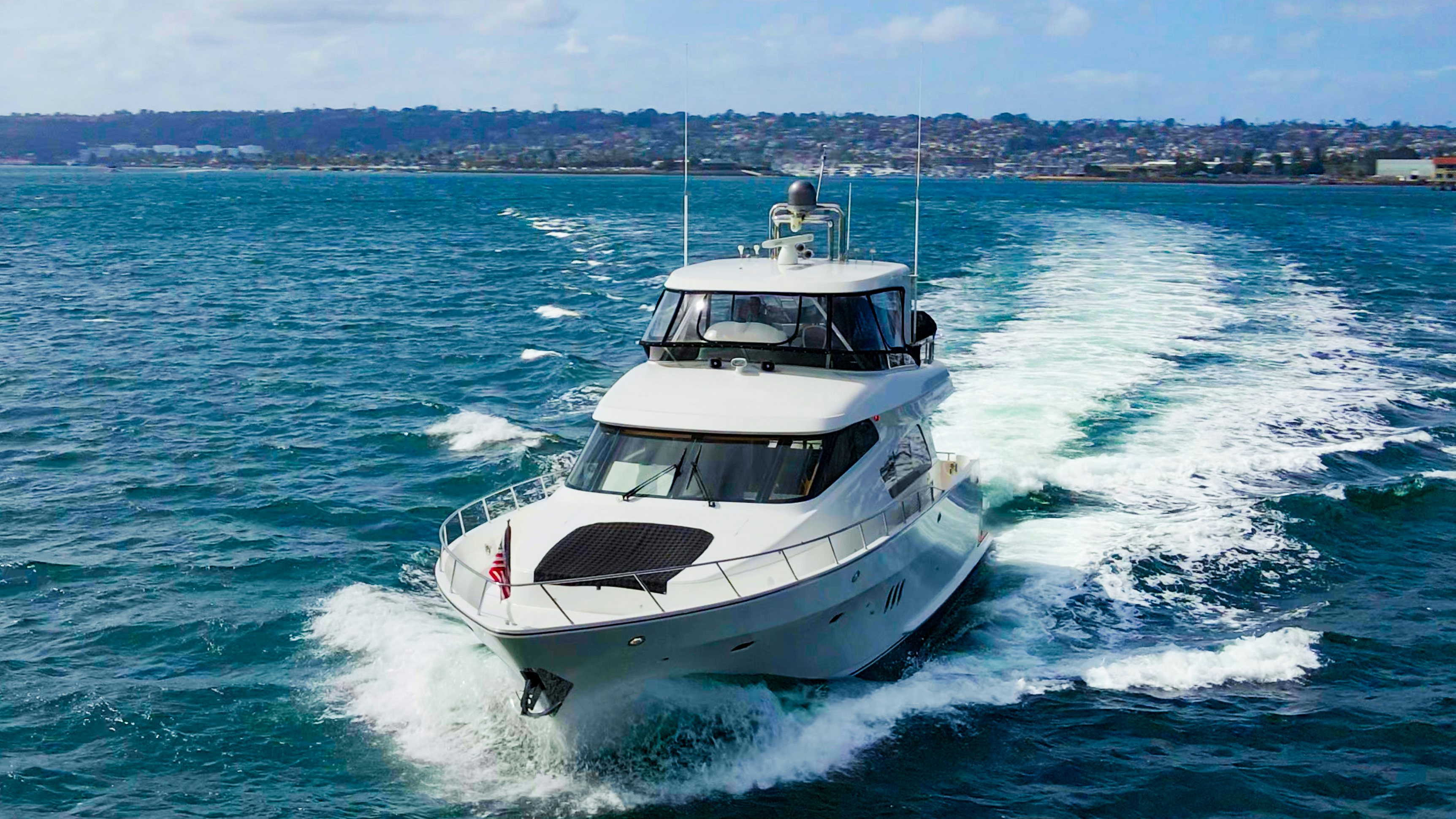 a boat on the water aboard YOLO Yacht for Sale