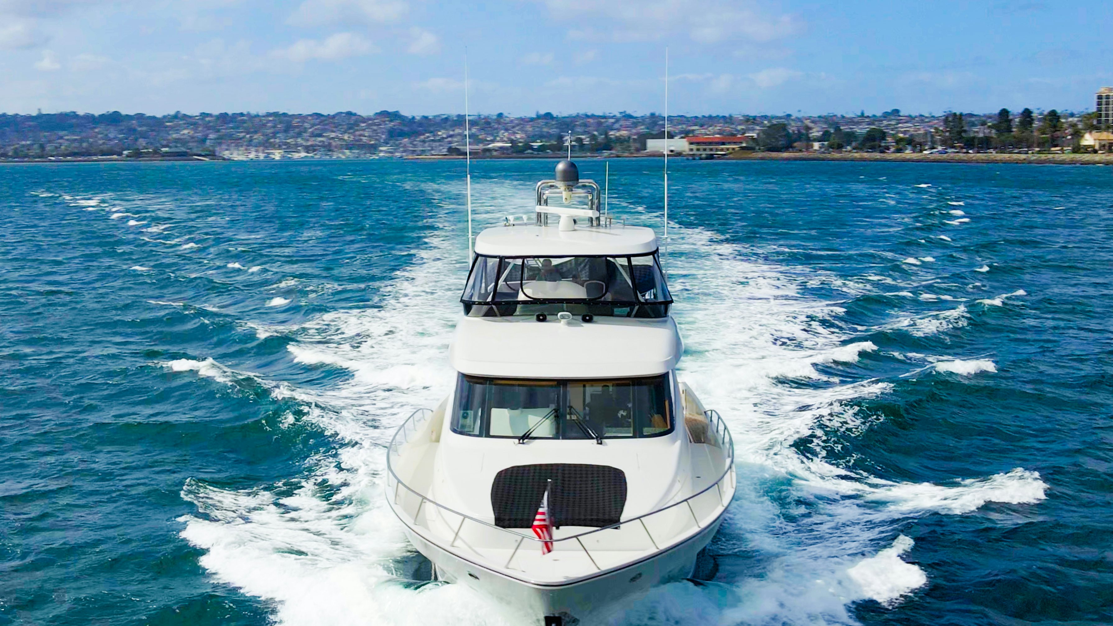 a boat on the water aboard YOLO Yacht for Sale
