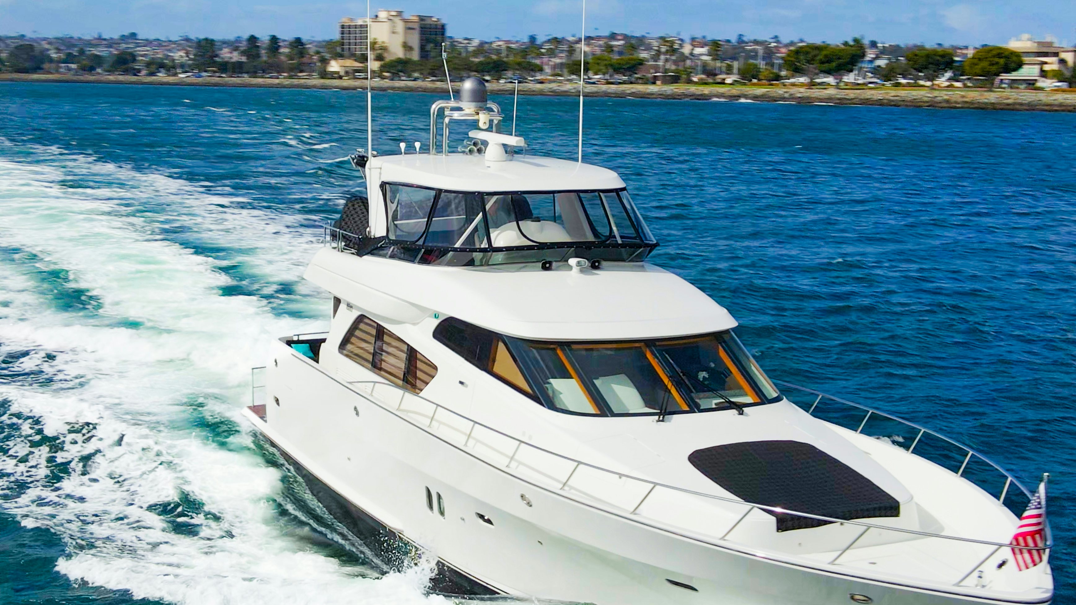 a boat on the water aboard YOLO Yacht for Sale