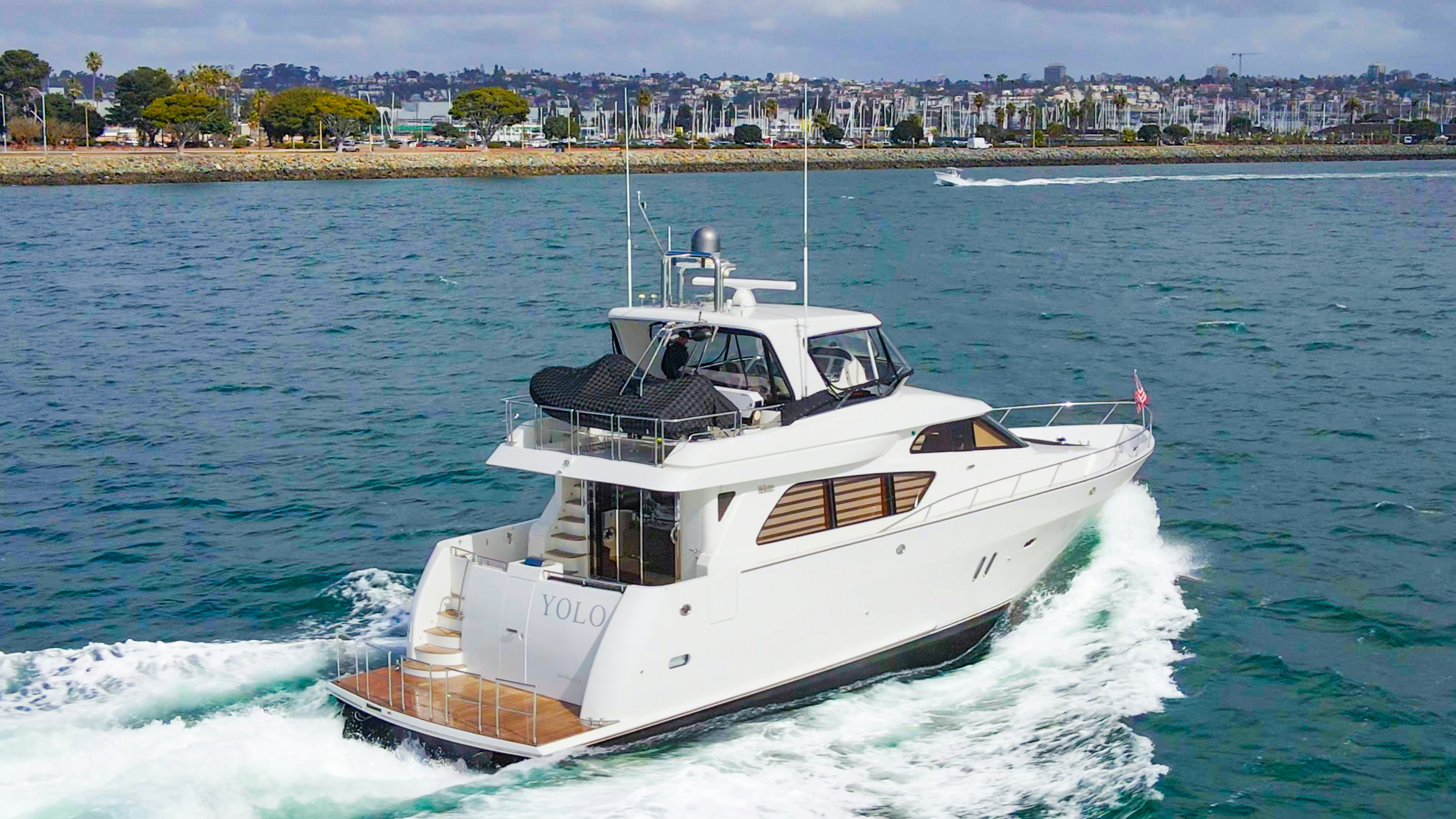 a boat on the water aboard YOLO Yacht for Sale