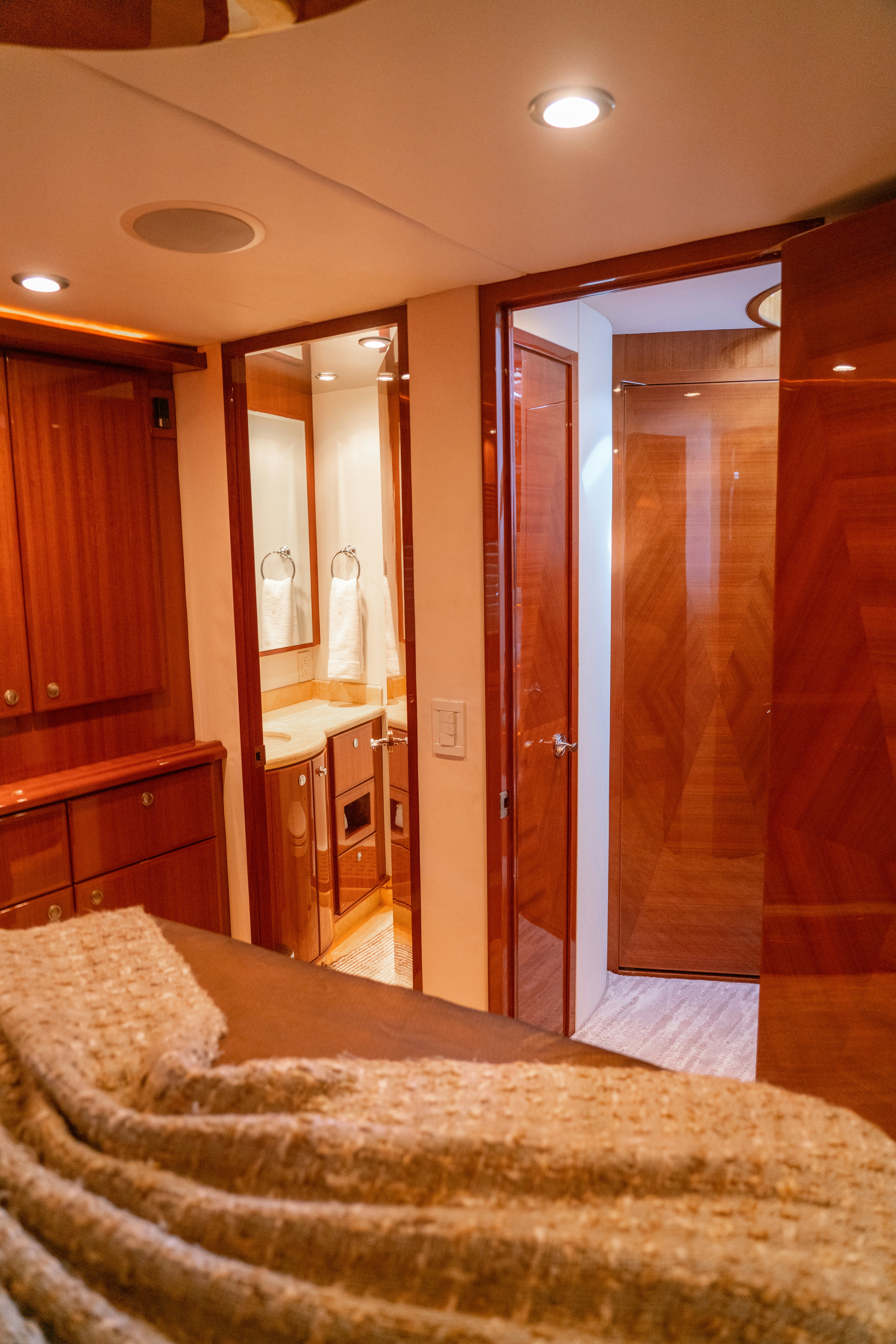 a bathroom with a large mirror aboard YOLO Yacht for Sale