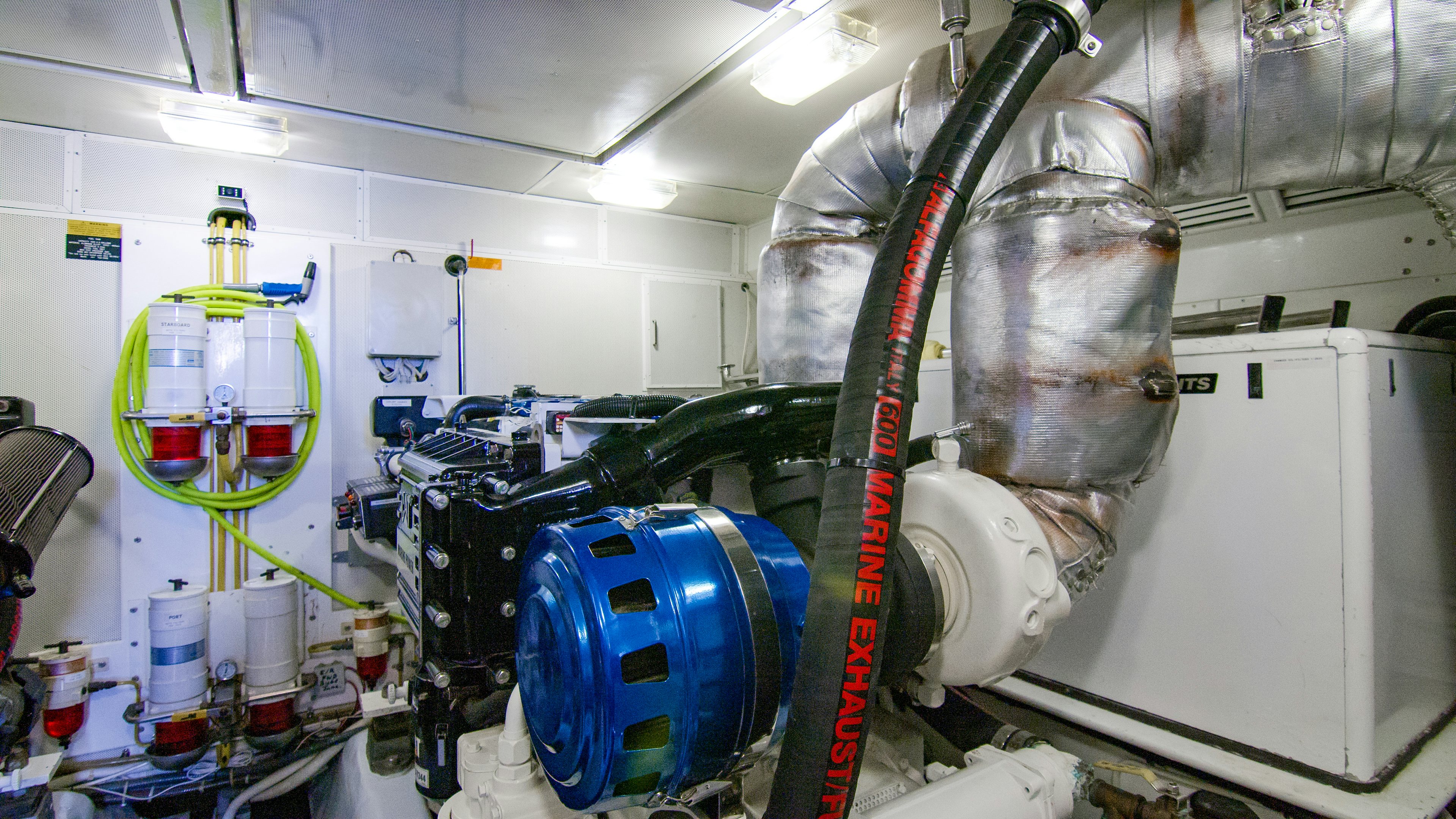 a machine with a large metal cylinder aboard YOLO Yacht for Sale