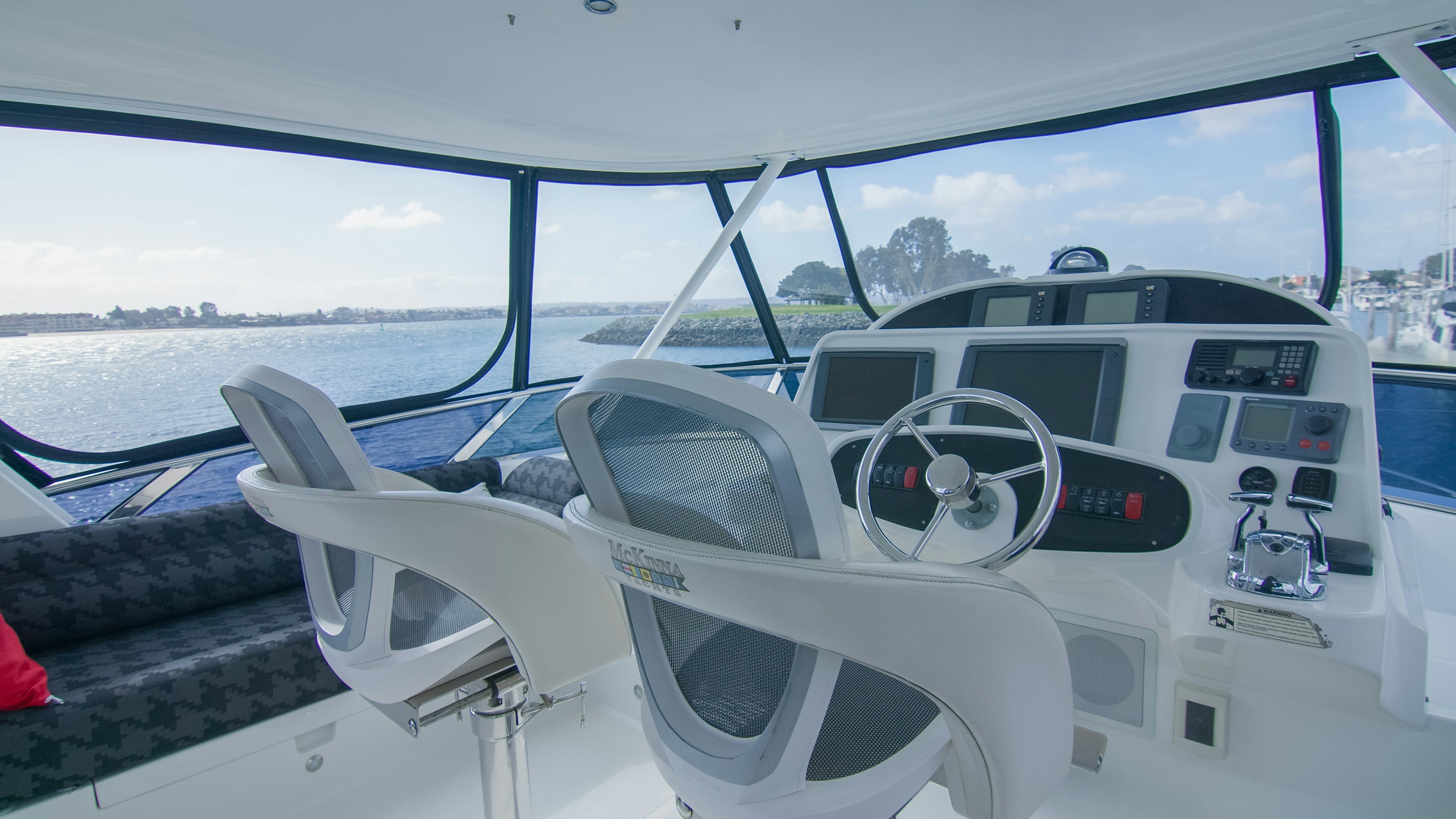 the front of a white car aboard YOLO Yacht for Sale