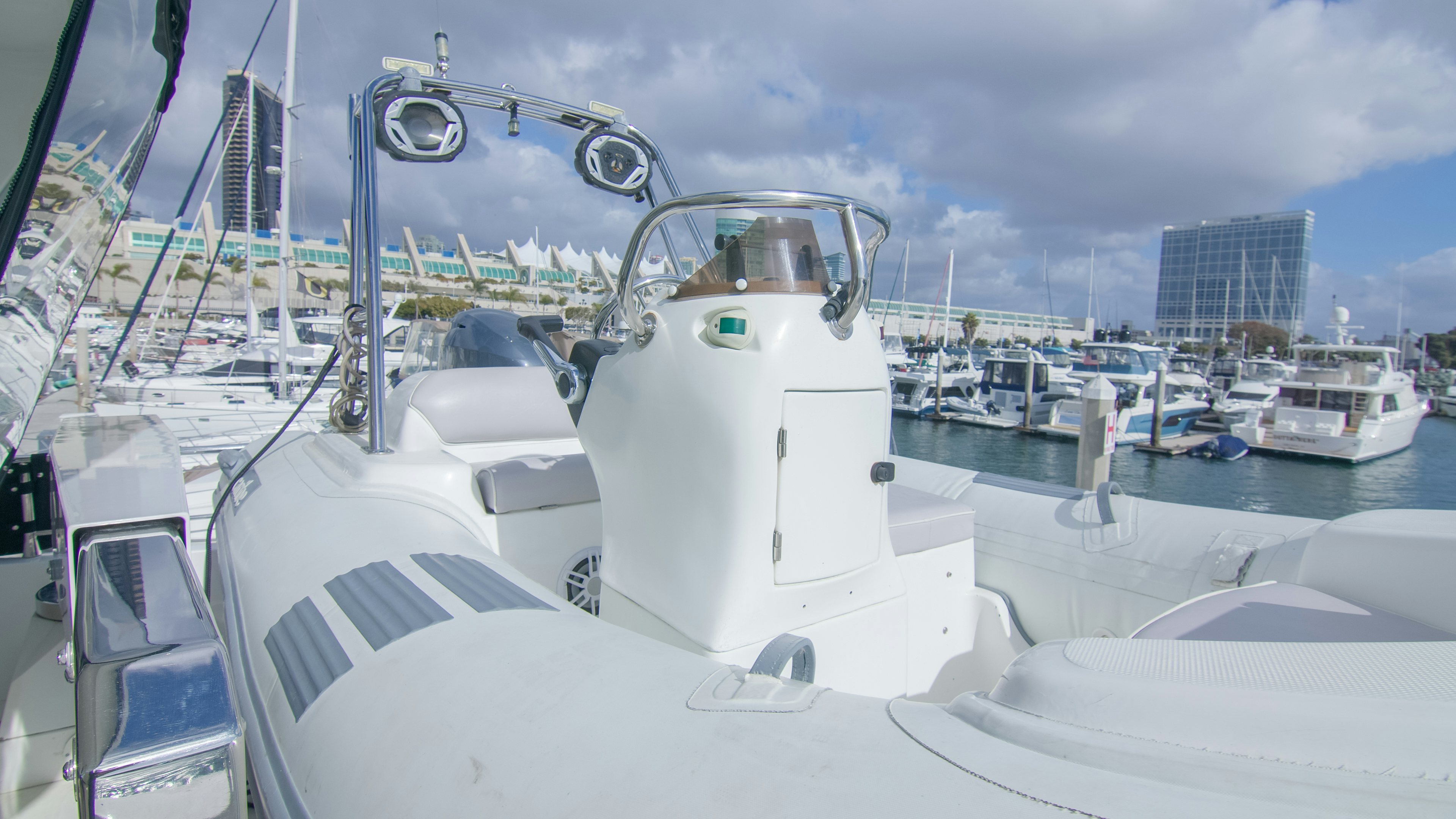 a white yacht in the water aboard YOLO Yacht for Sale