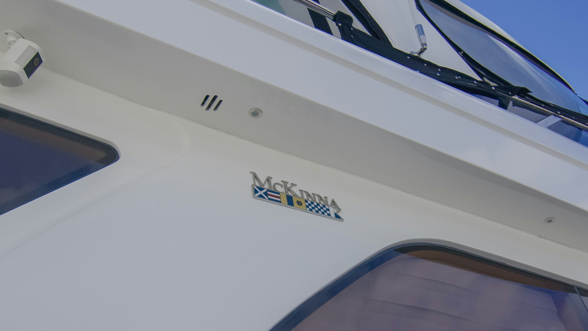 the front of a white car aboard YOLO Yacht for Sale