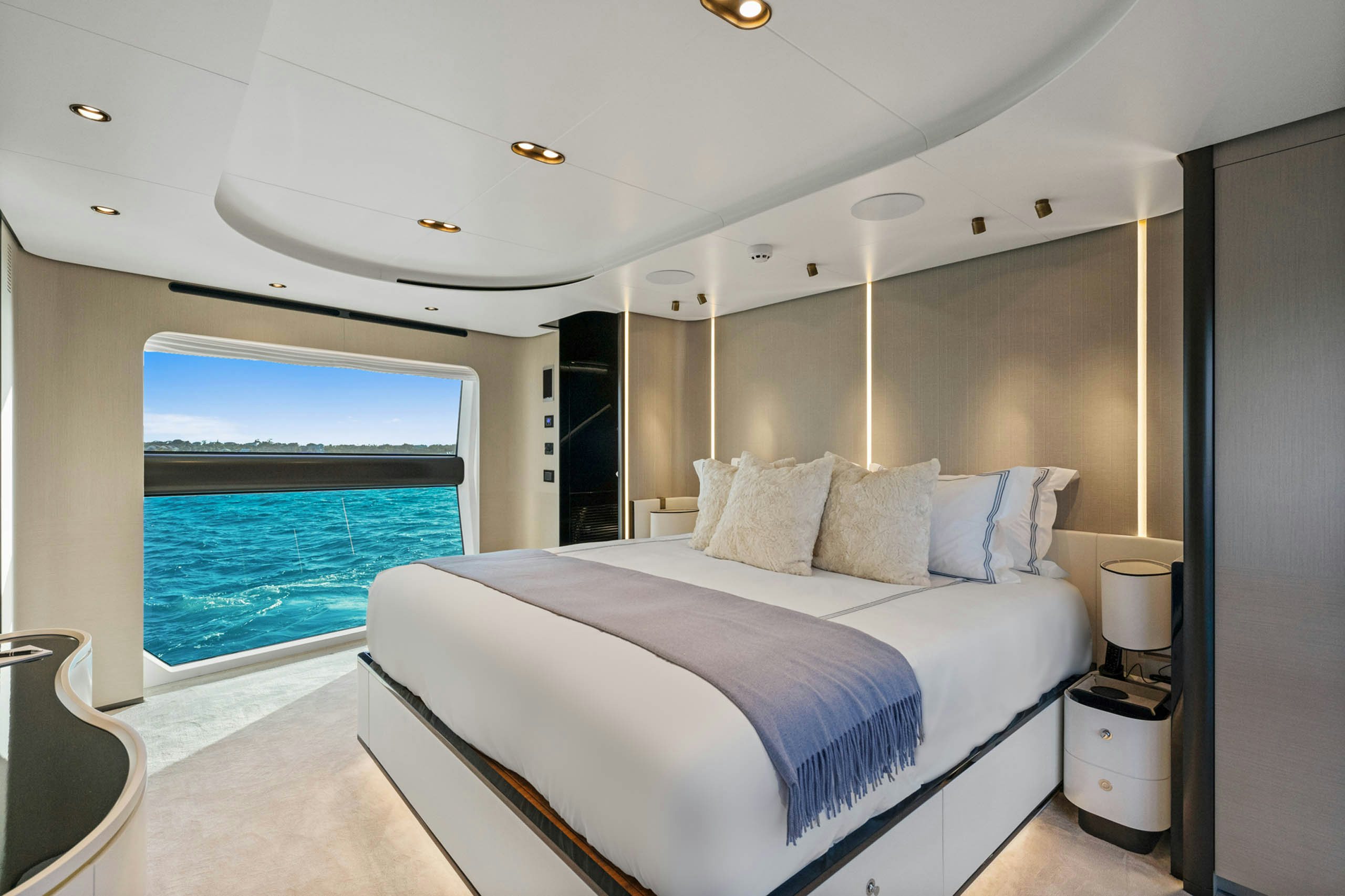 a large bedroom with a large bed aboard SEA OWL Yacht for Charter