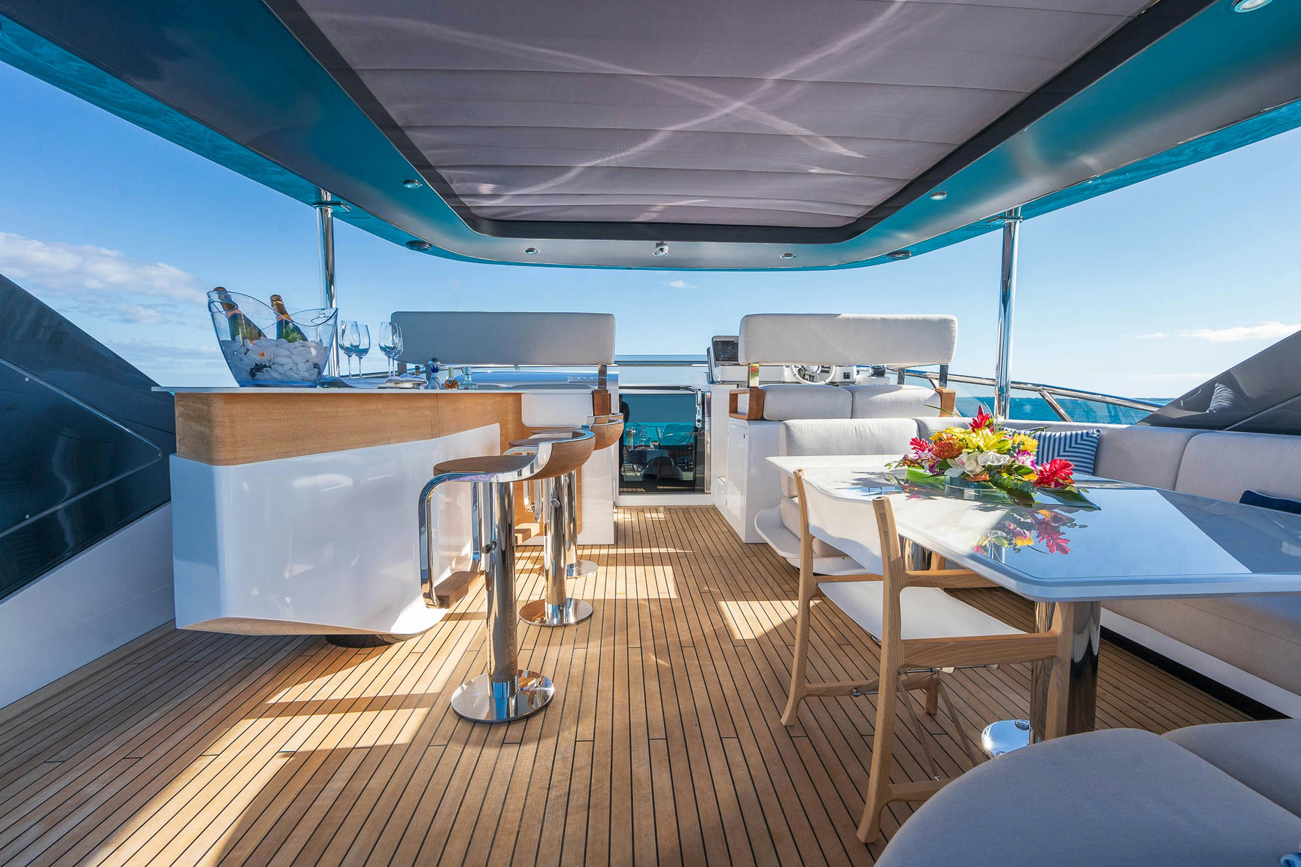 a room with a table and chairs aboard SEA OWL Yacht for Charter
