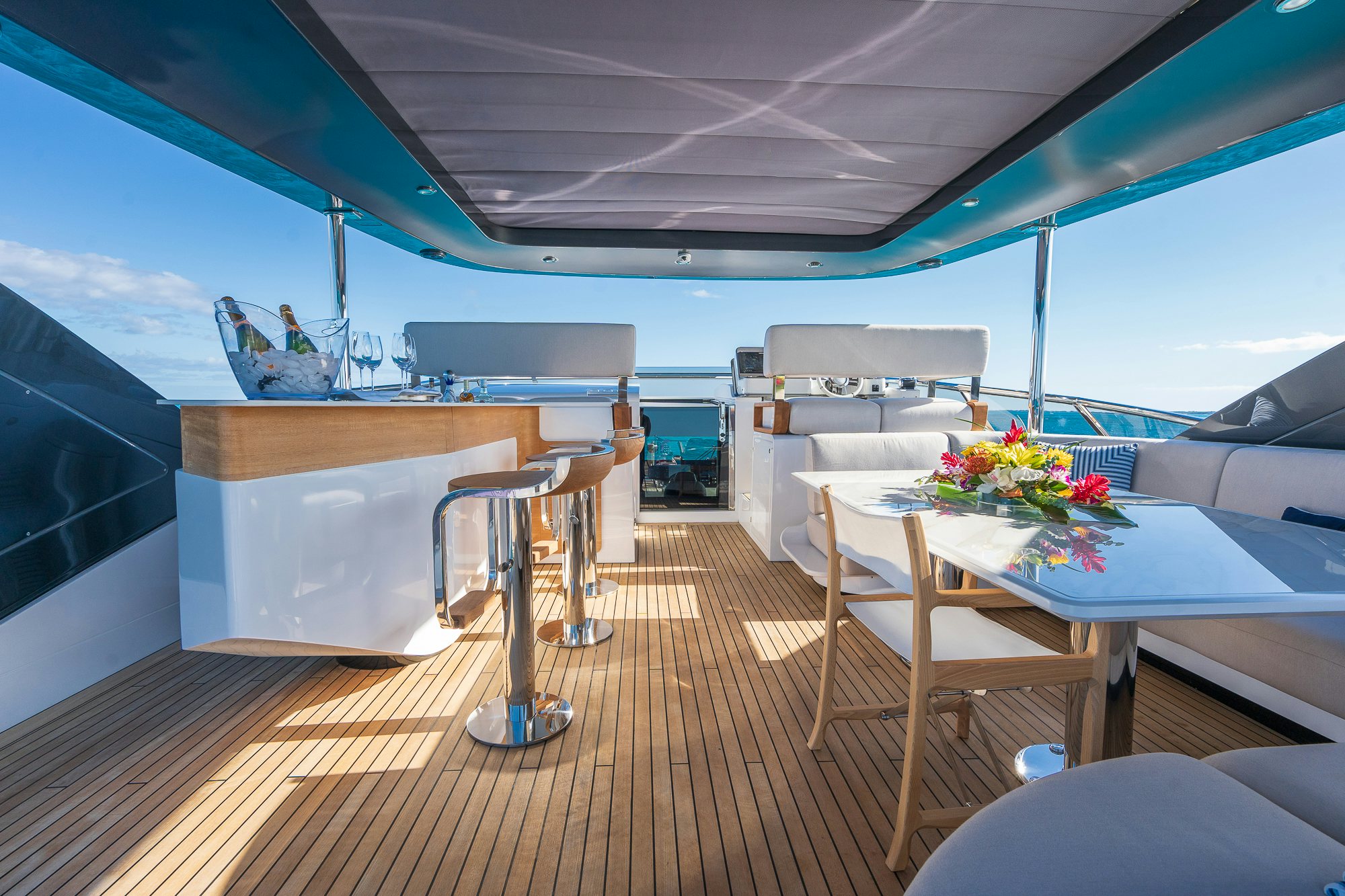 a room with a table and chairs aboard SEA OWL Yacht for Charter
