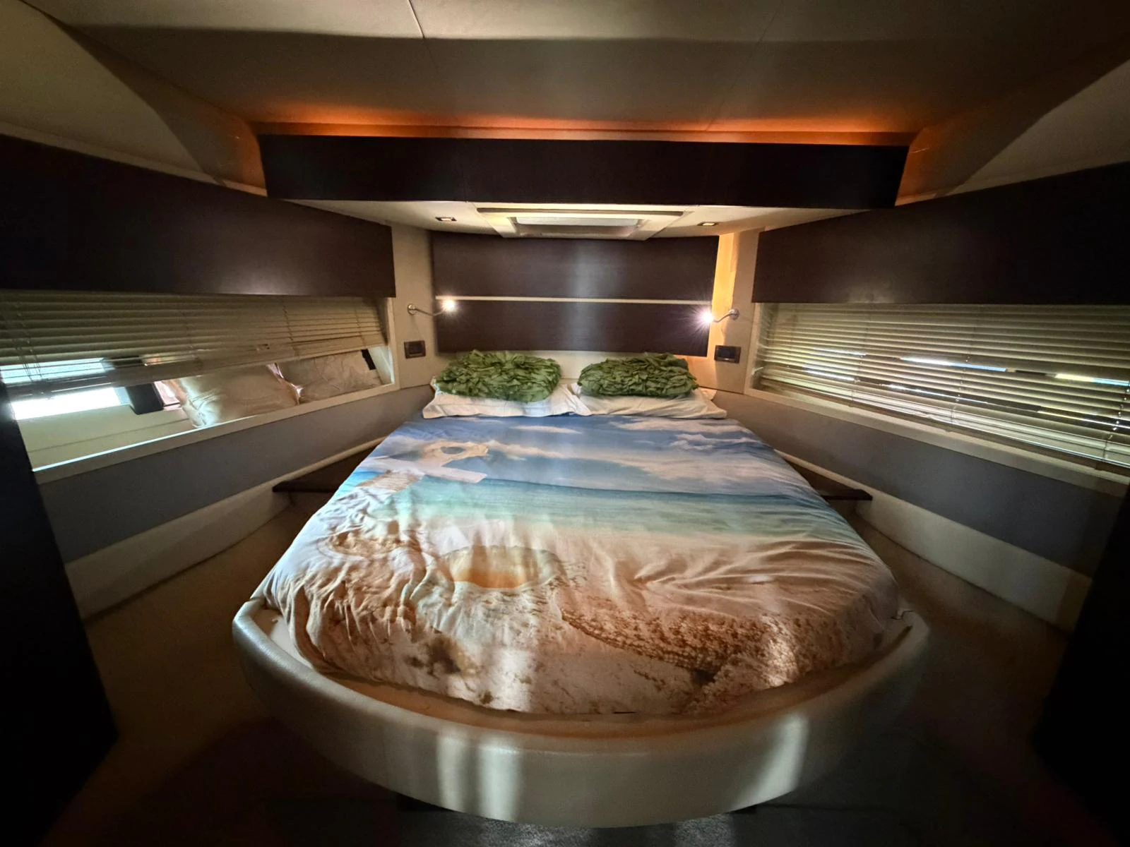 a large round cake sits on a plate in a kitchen aboard ROCK STAR DREAMS Yacht for Sale