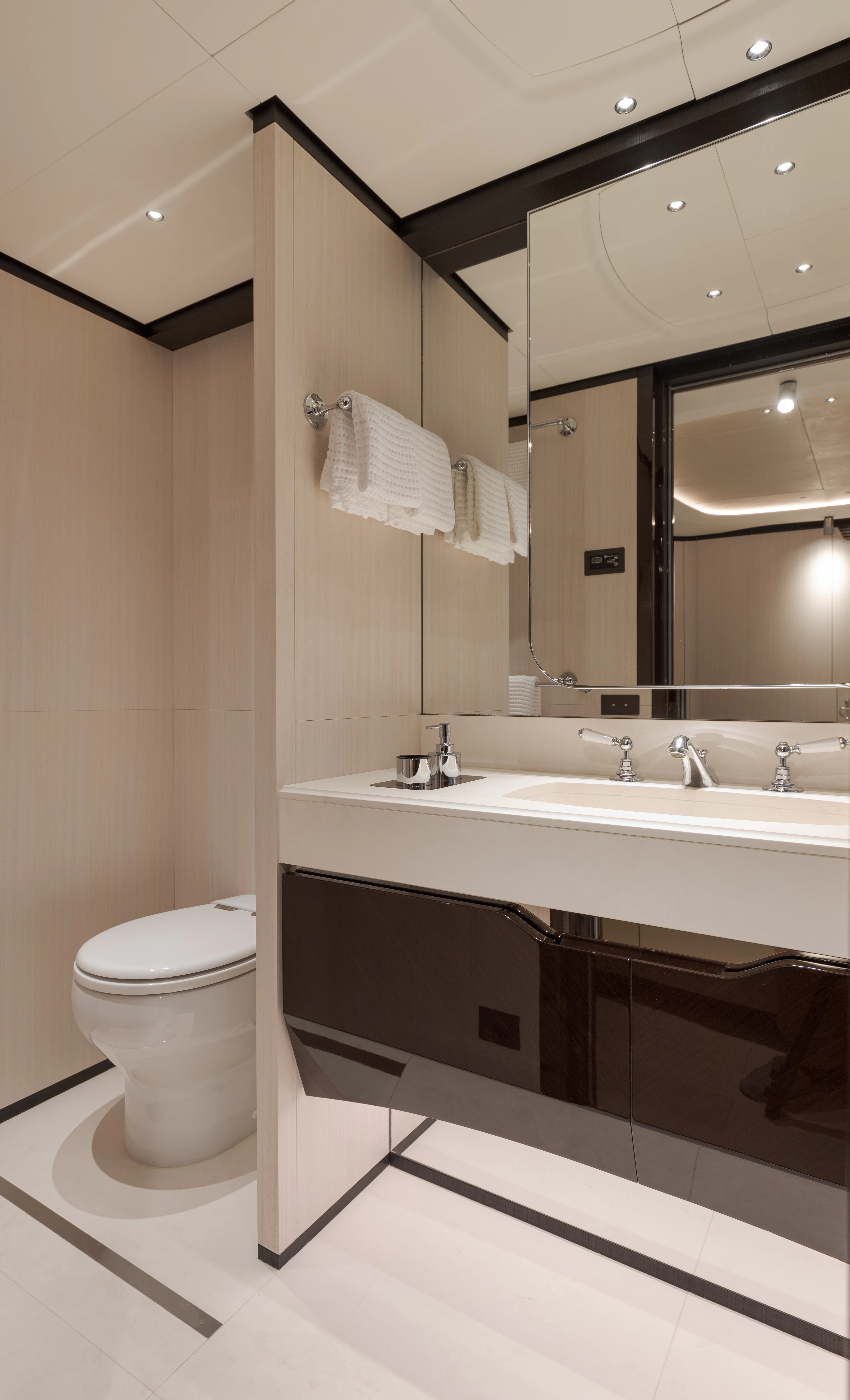 a bathroom with a large mirror aboard BELLA VITA Yacht for Charter