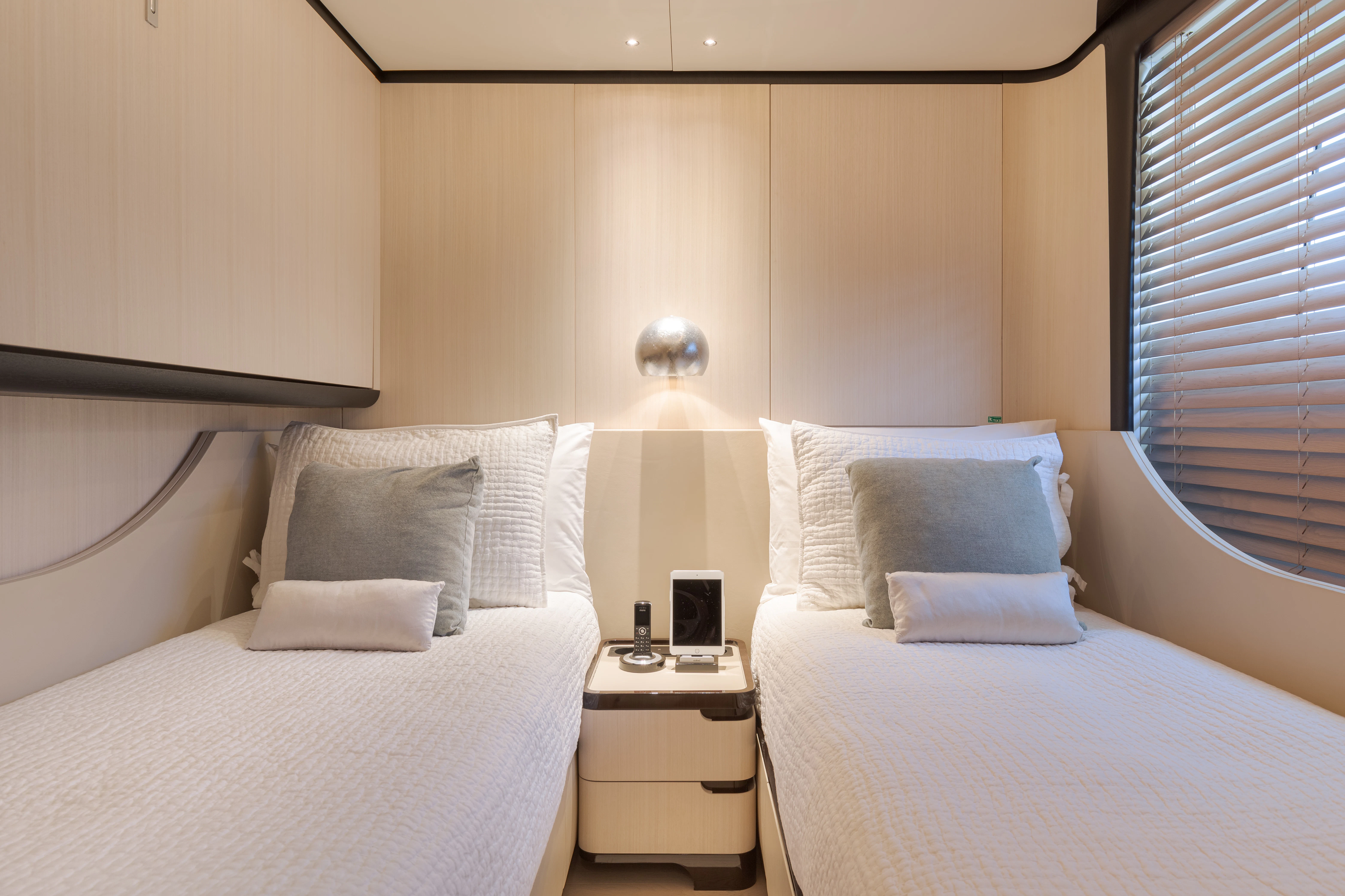 a couple of beds in a hotel room aboard BELLA VITA Yacht for Charter