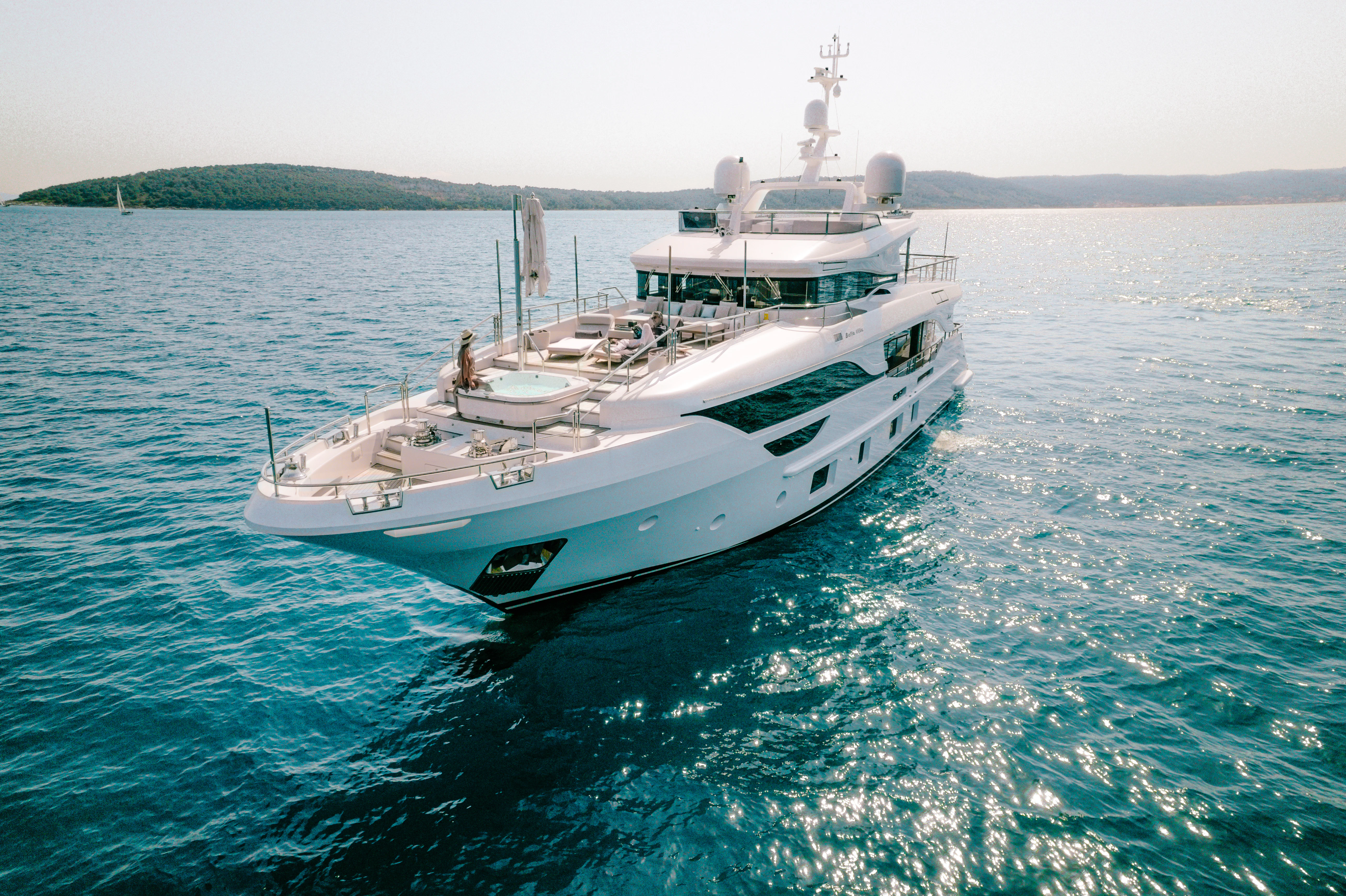 a white boat in the water aboard BELLA VITA Yacht for Charter