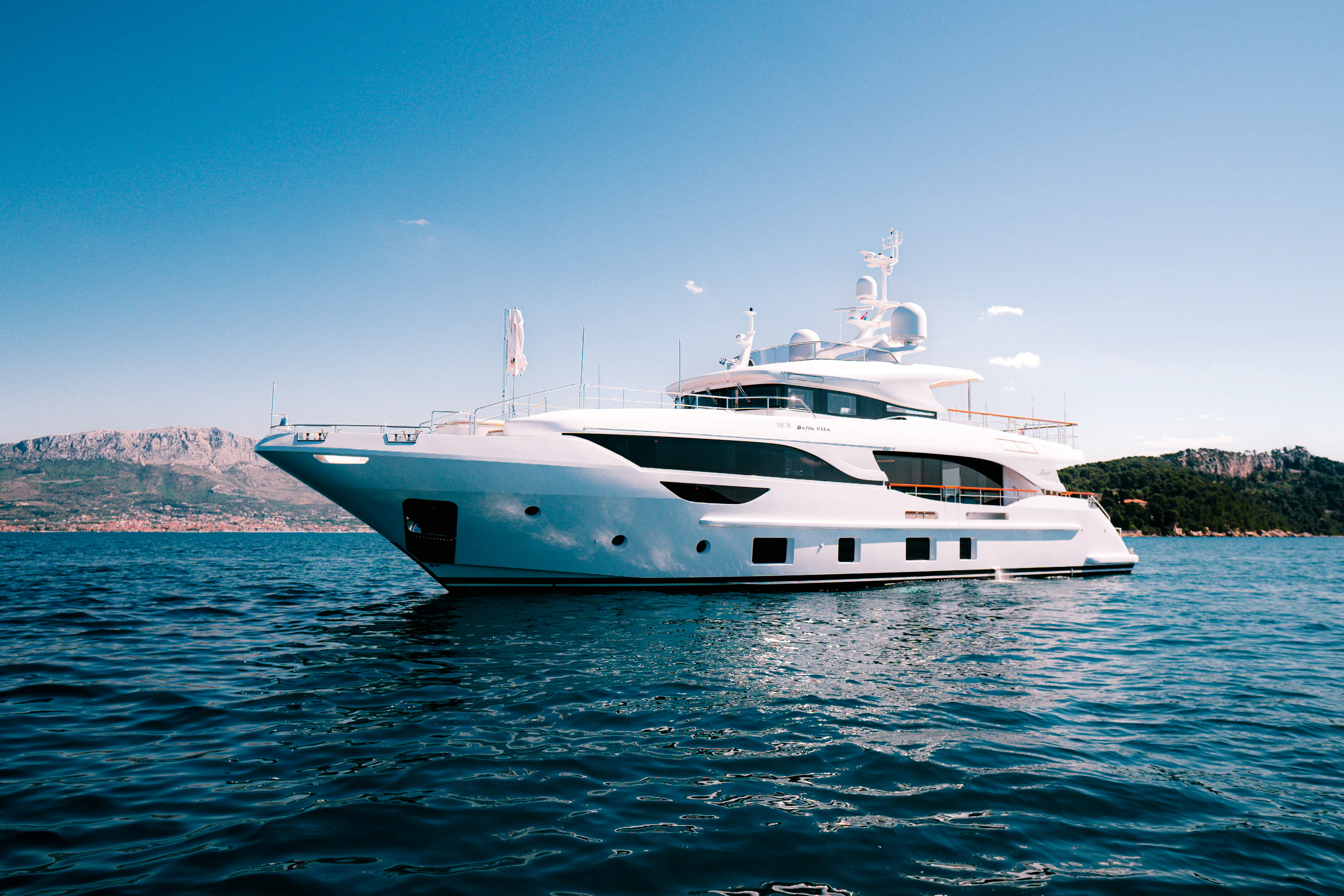 a white yacht in the water aboard BELLA VITA Yacht for Charter