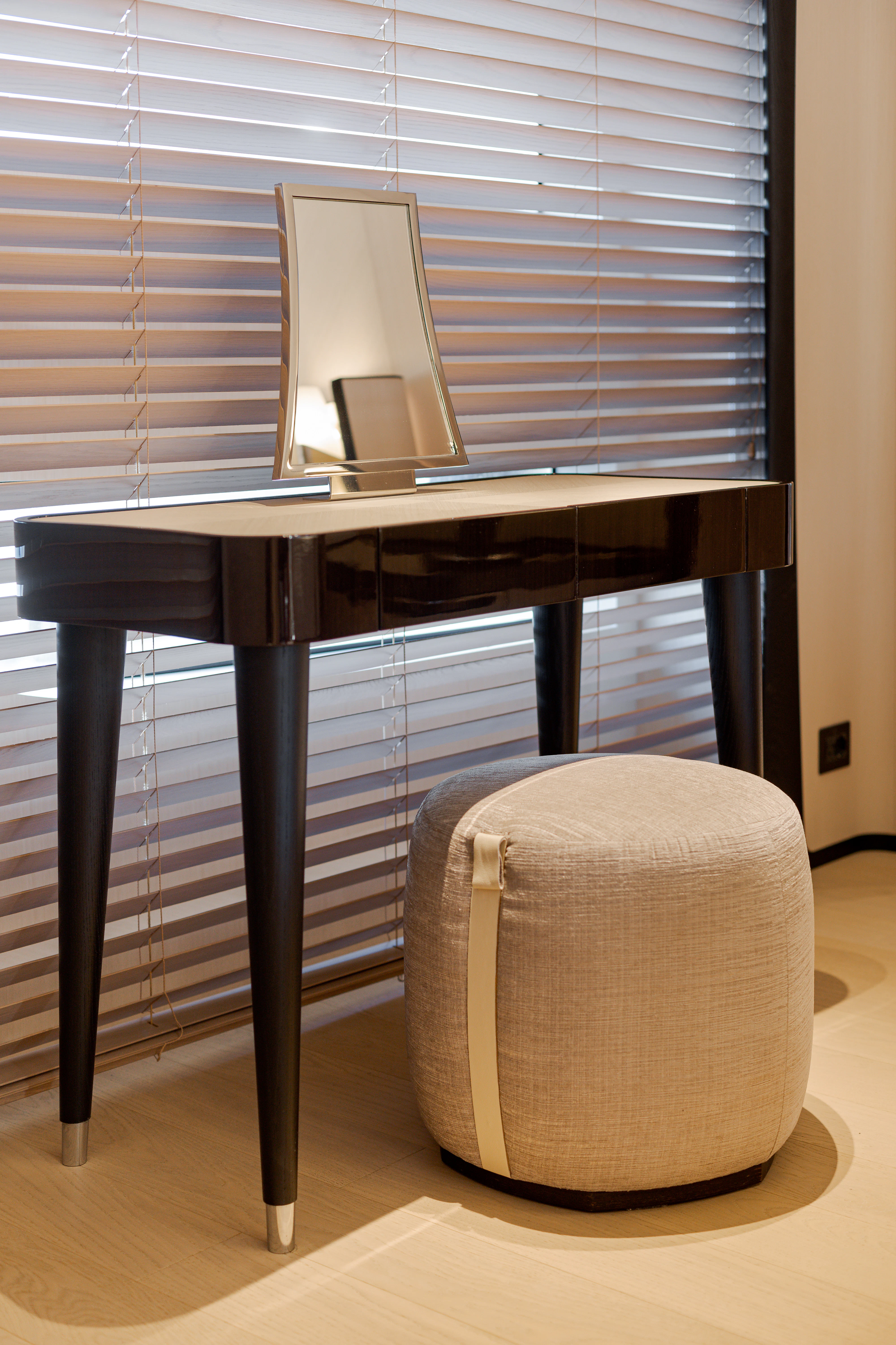 a chair in front of a window aboard BELLA VITA Yacht for Charter