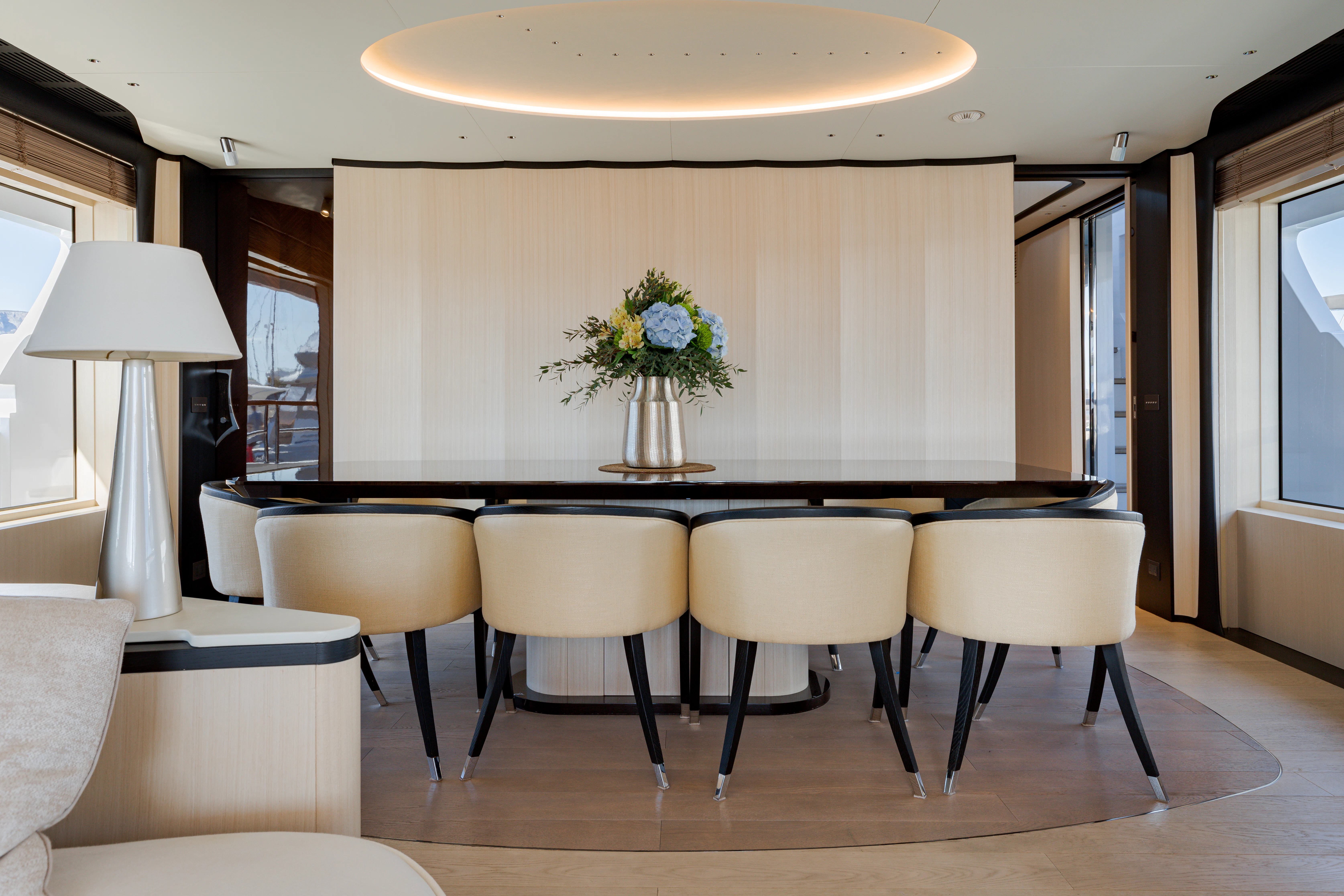 a room with a table and chairs aboard BELLA VITA Yacht for Charter