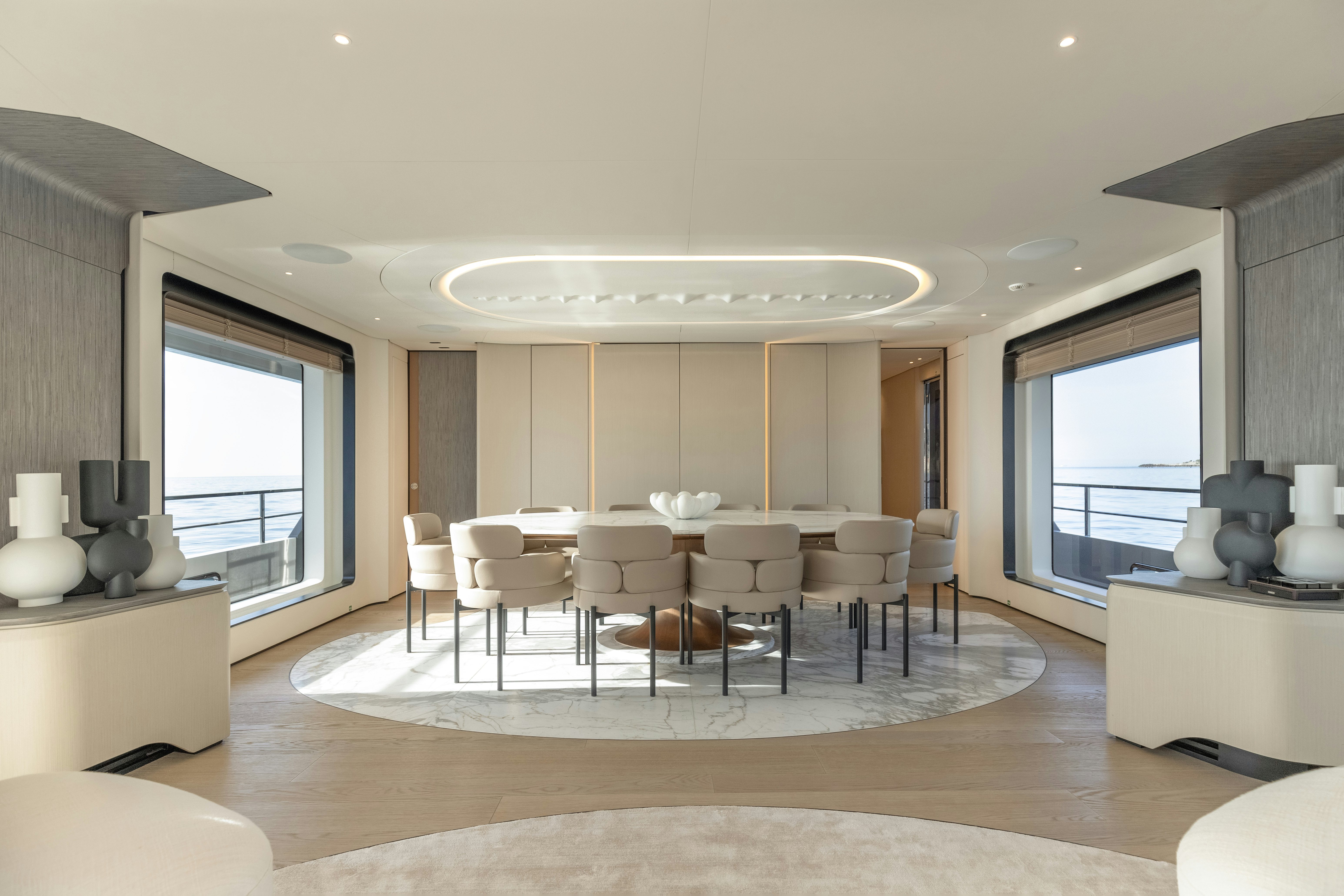 a modern looking living room aboard H Yacht for Sale