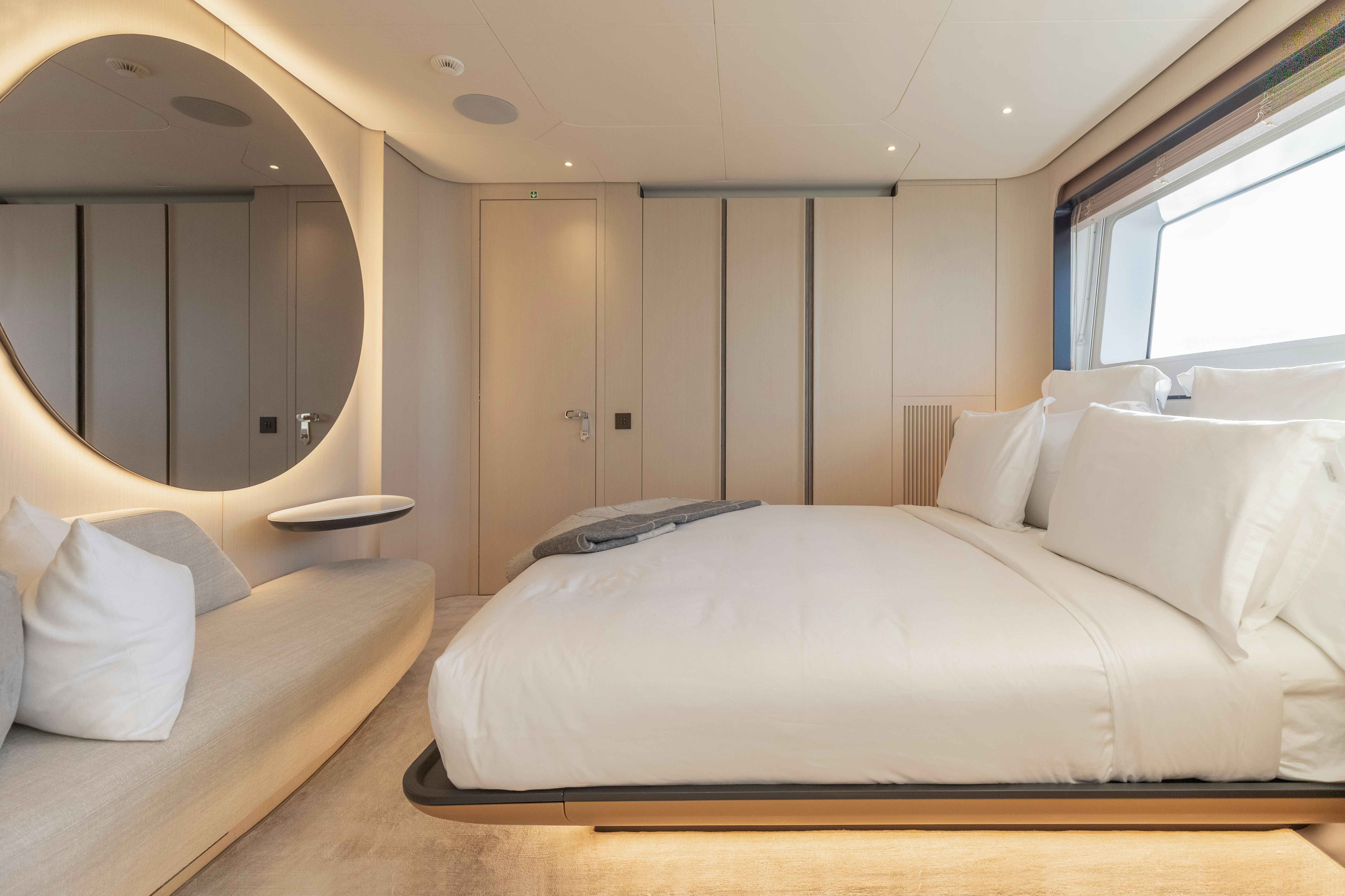 a large bed in a room aboard H Yacht for Sale