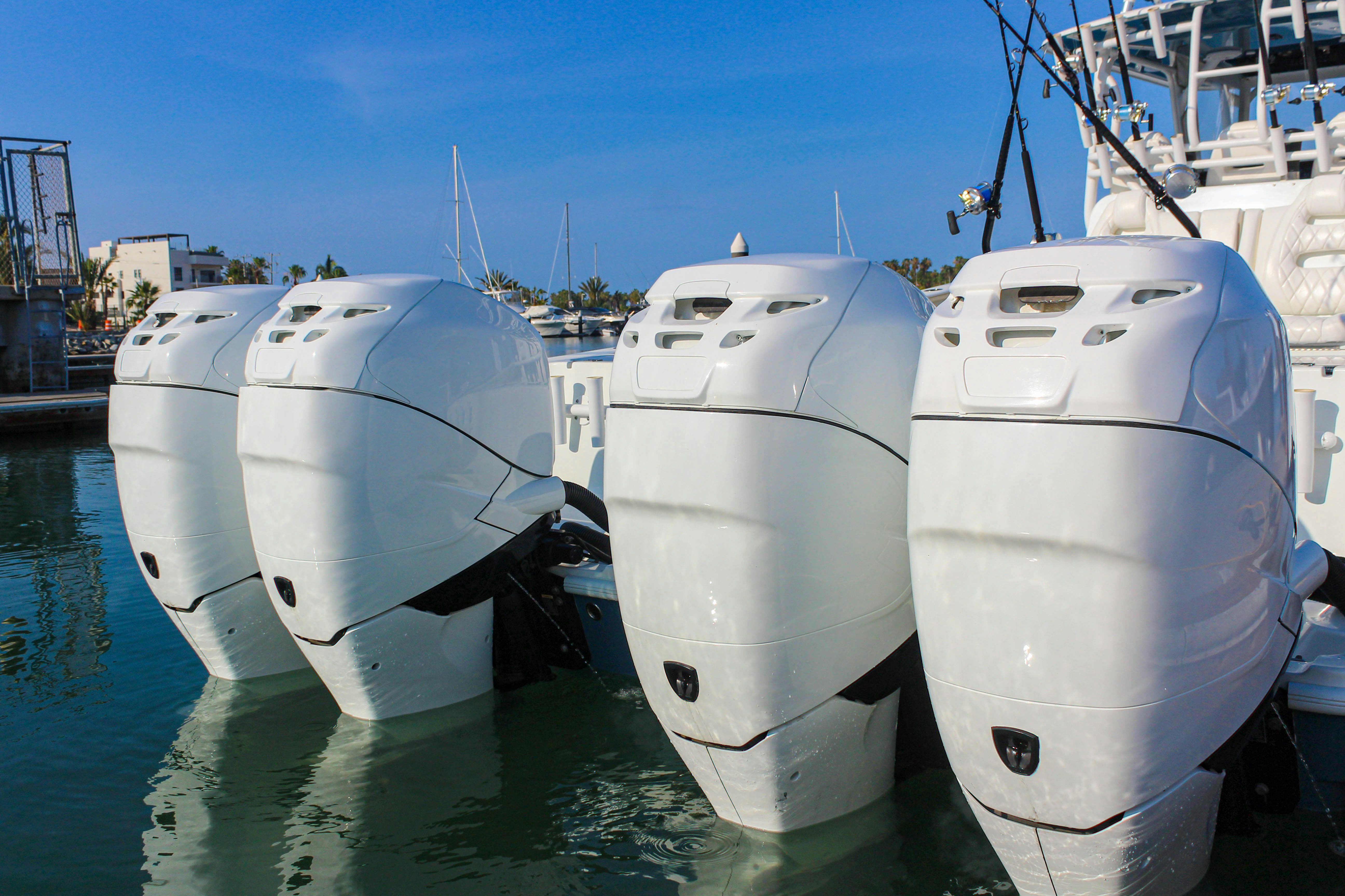 several white boats in a harbor aboard LET'S GO Yacht for Sale