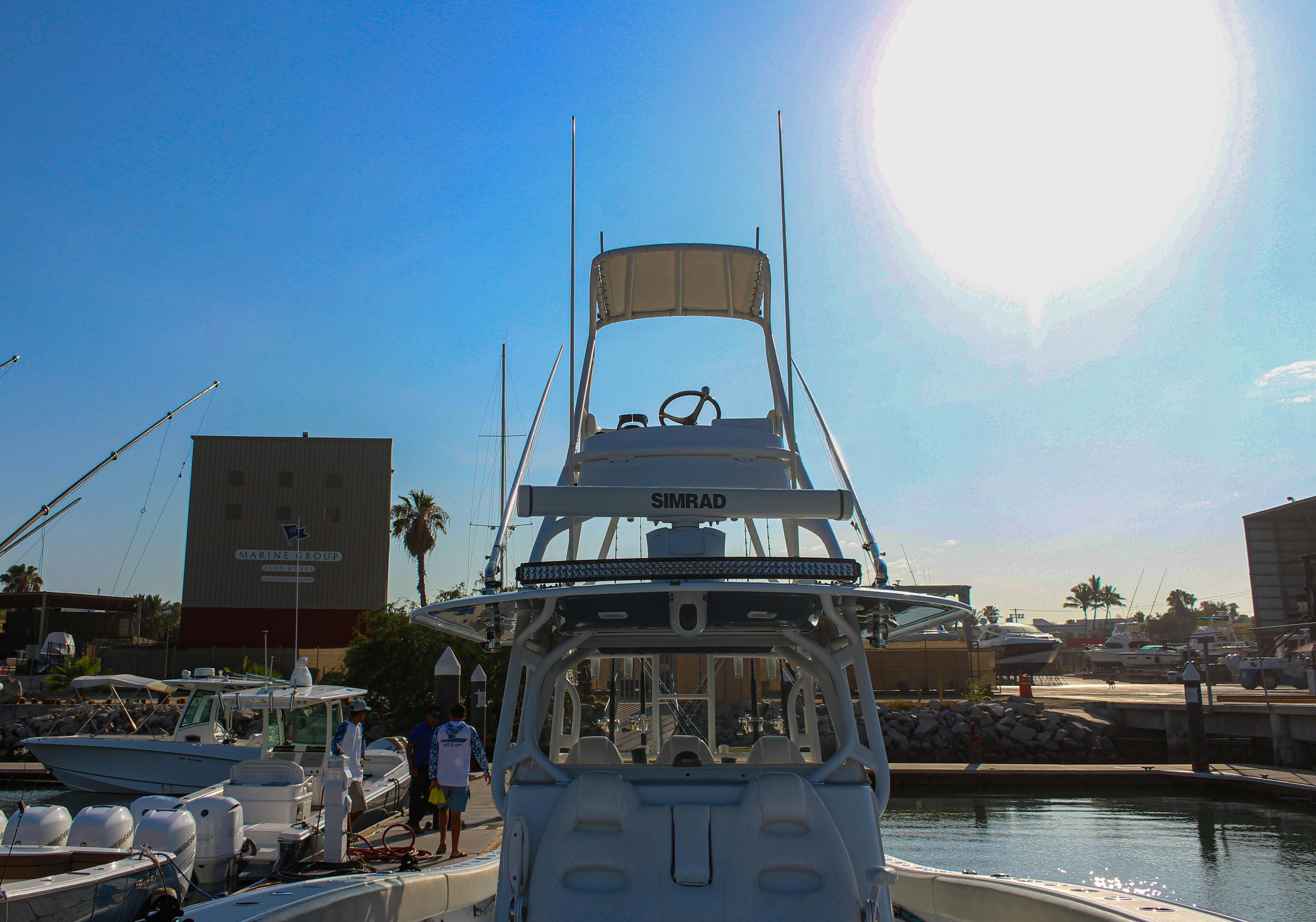 a large boat docked at a port aboard LET'S GO Yacht for Sale