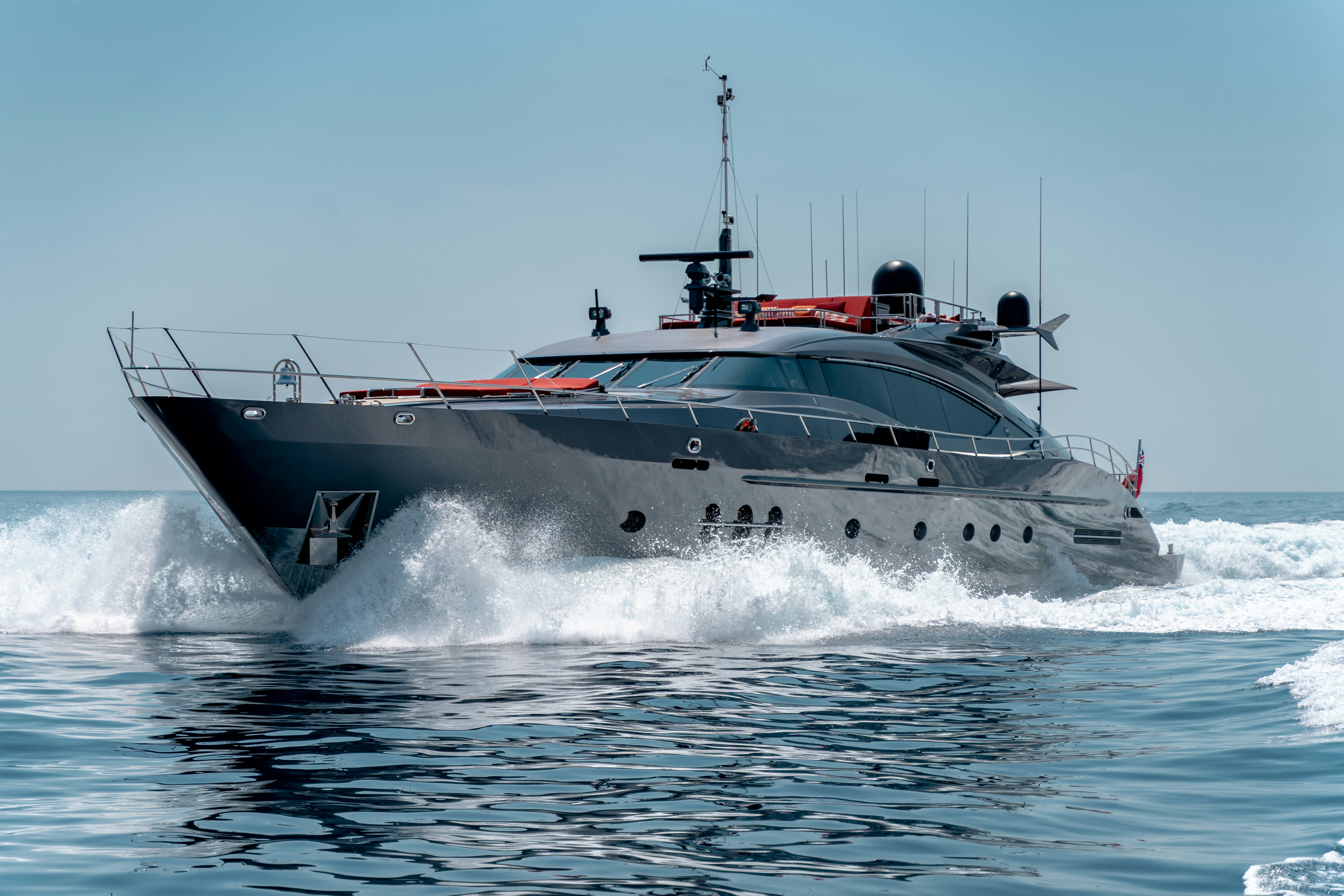 a large military boat in the water aboard KJOS Yacht for Sale