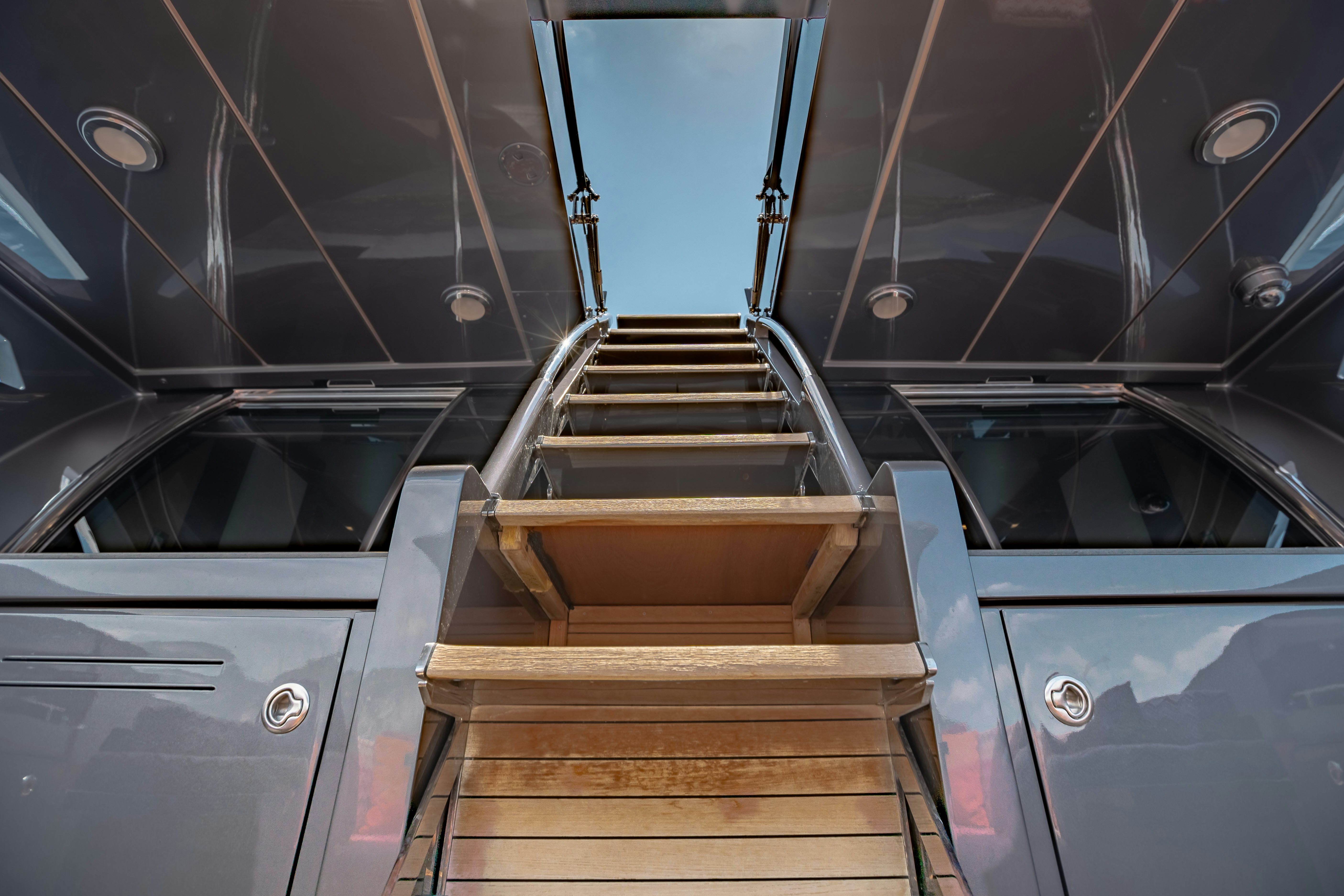 a staircase in a building aboard KJOS Yacht for Sale