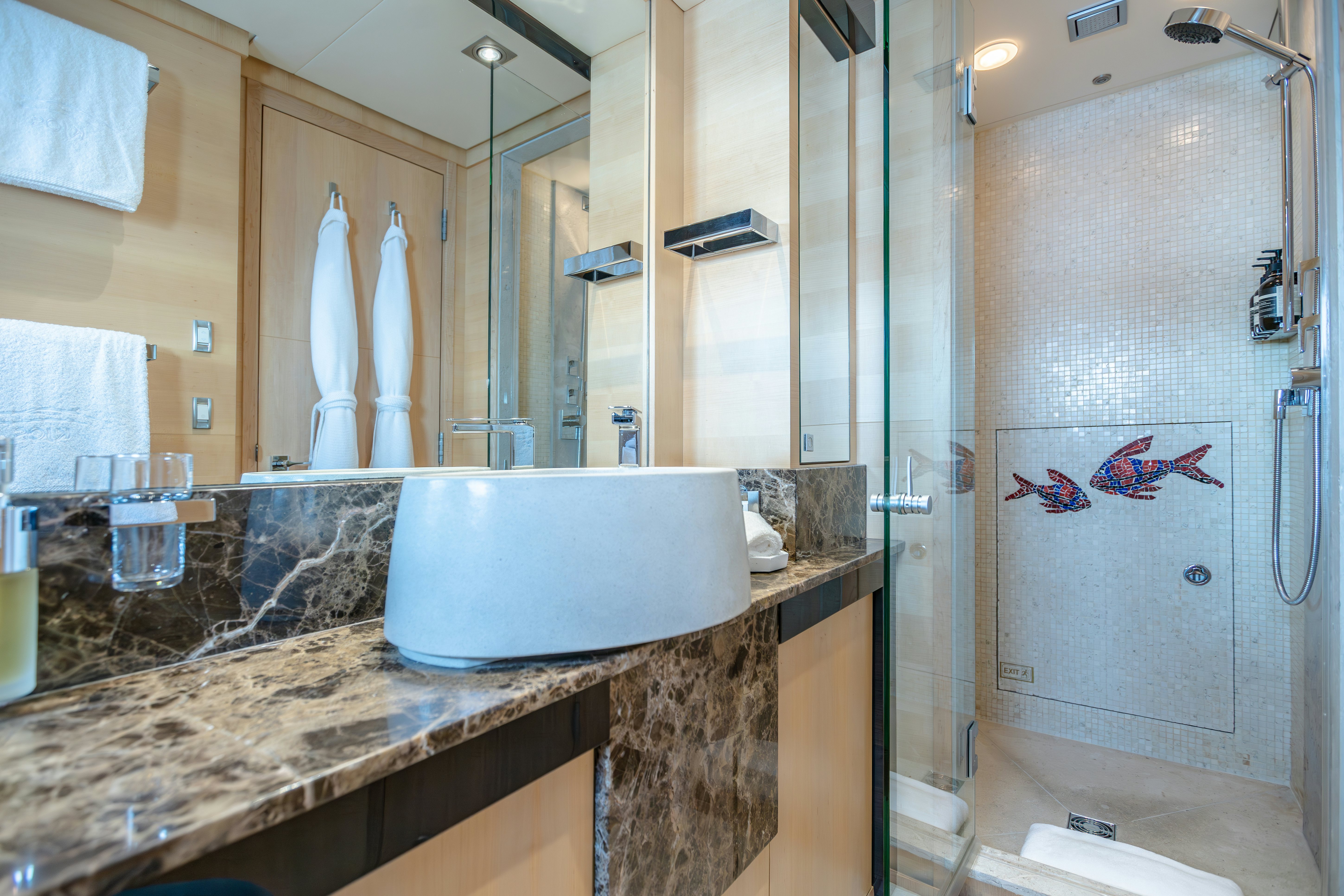 a bathroom with a large mirror aboard KJOS Yacht for Sale