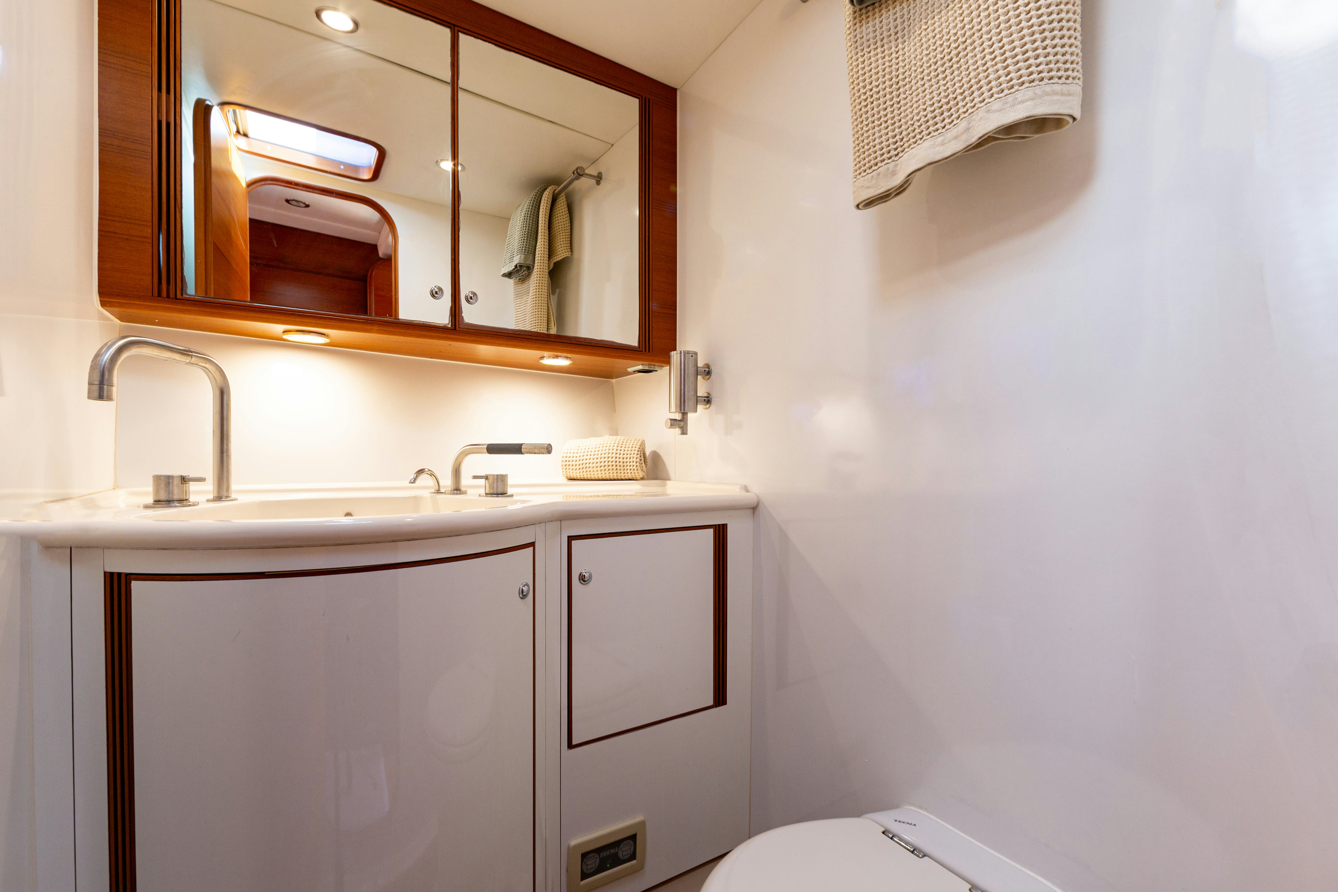 a bathroom with a mirror aboard FRIDA Yacht for Sale