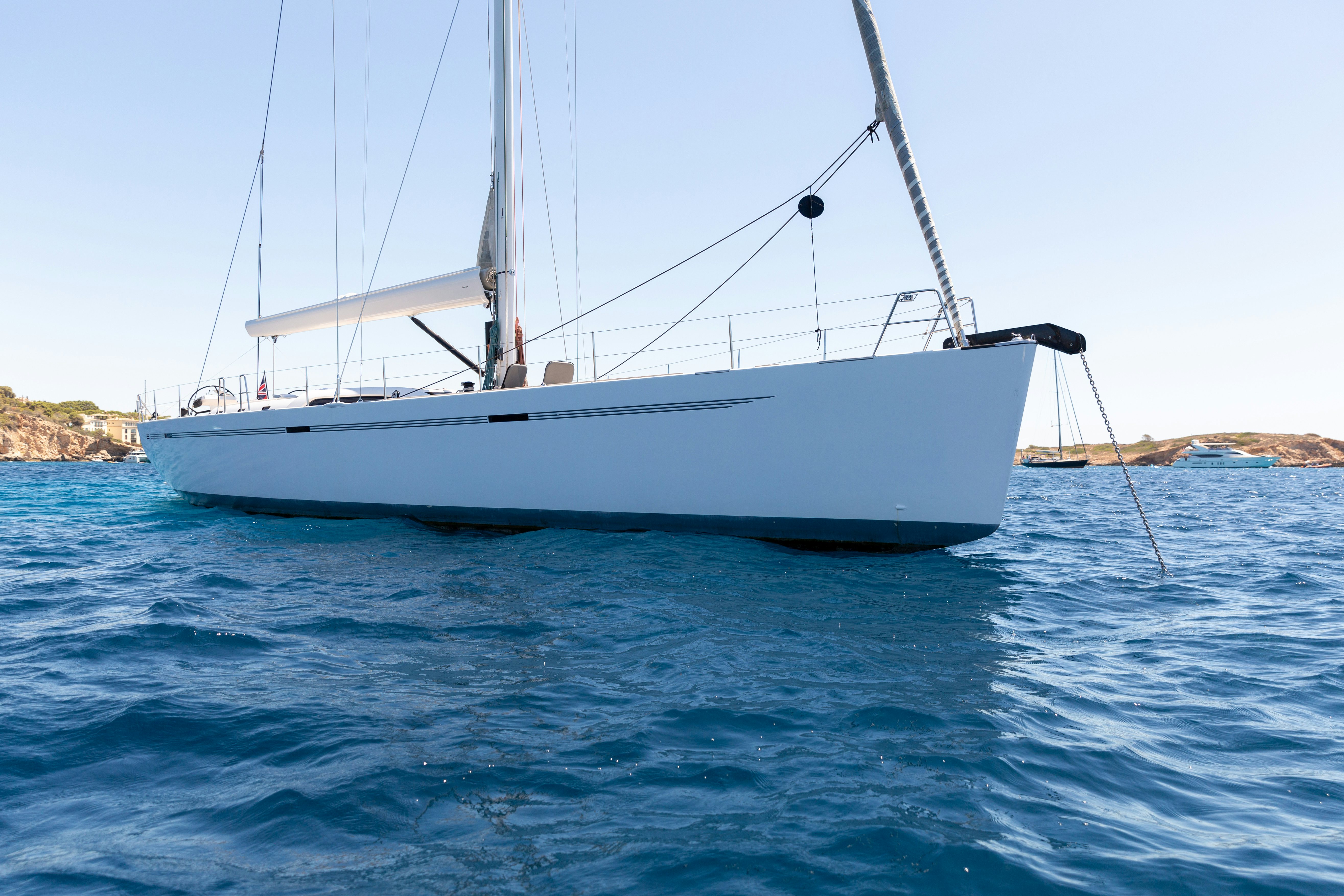 a white boat in the water aboard FRIDA Yacht for Sale