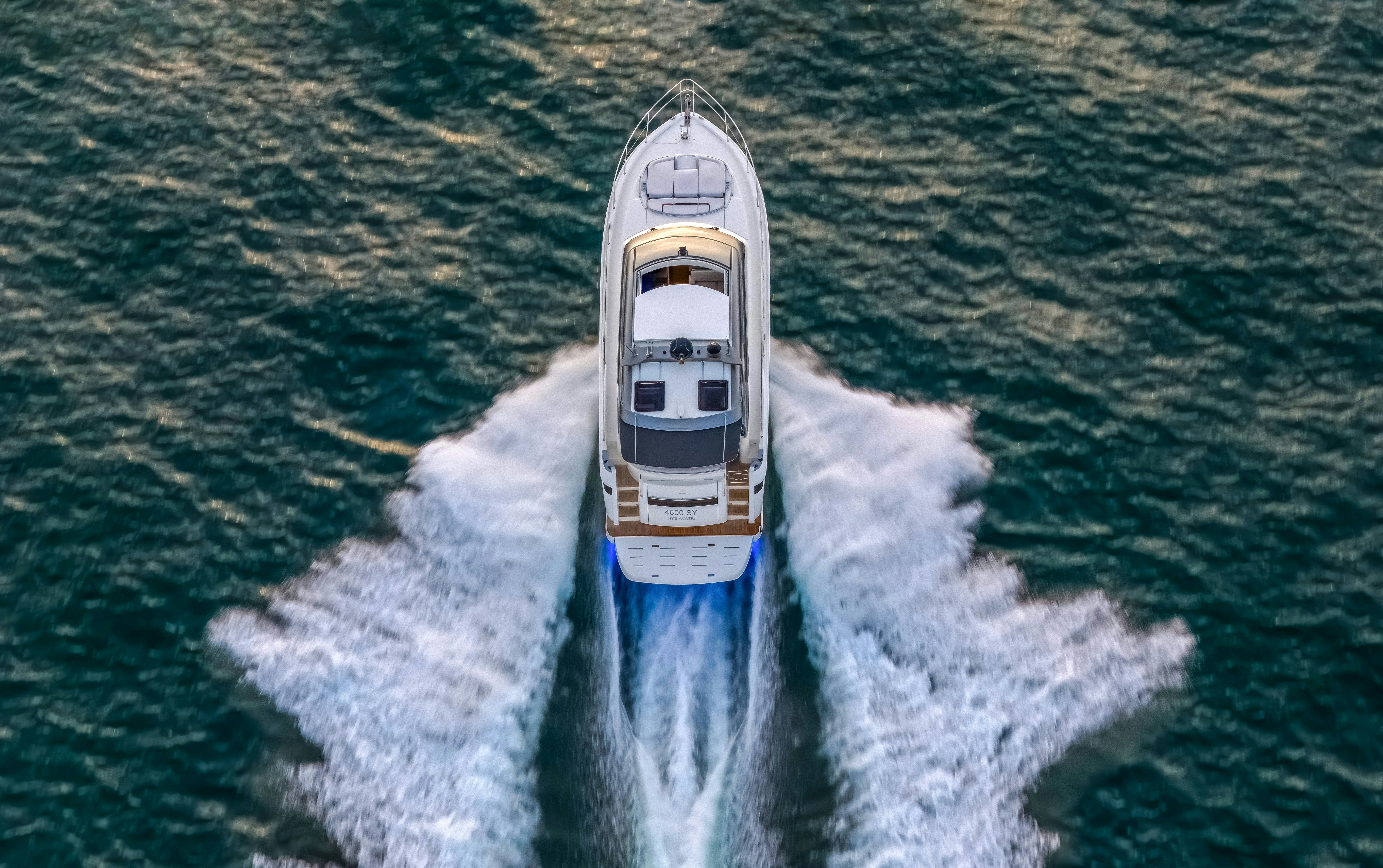 a boat in the water aboard RIVIERA 4600 SPORT YACHT Yacht for Sale