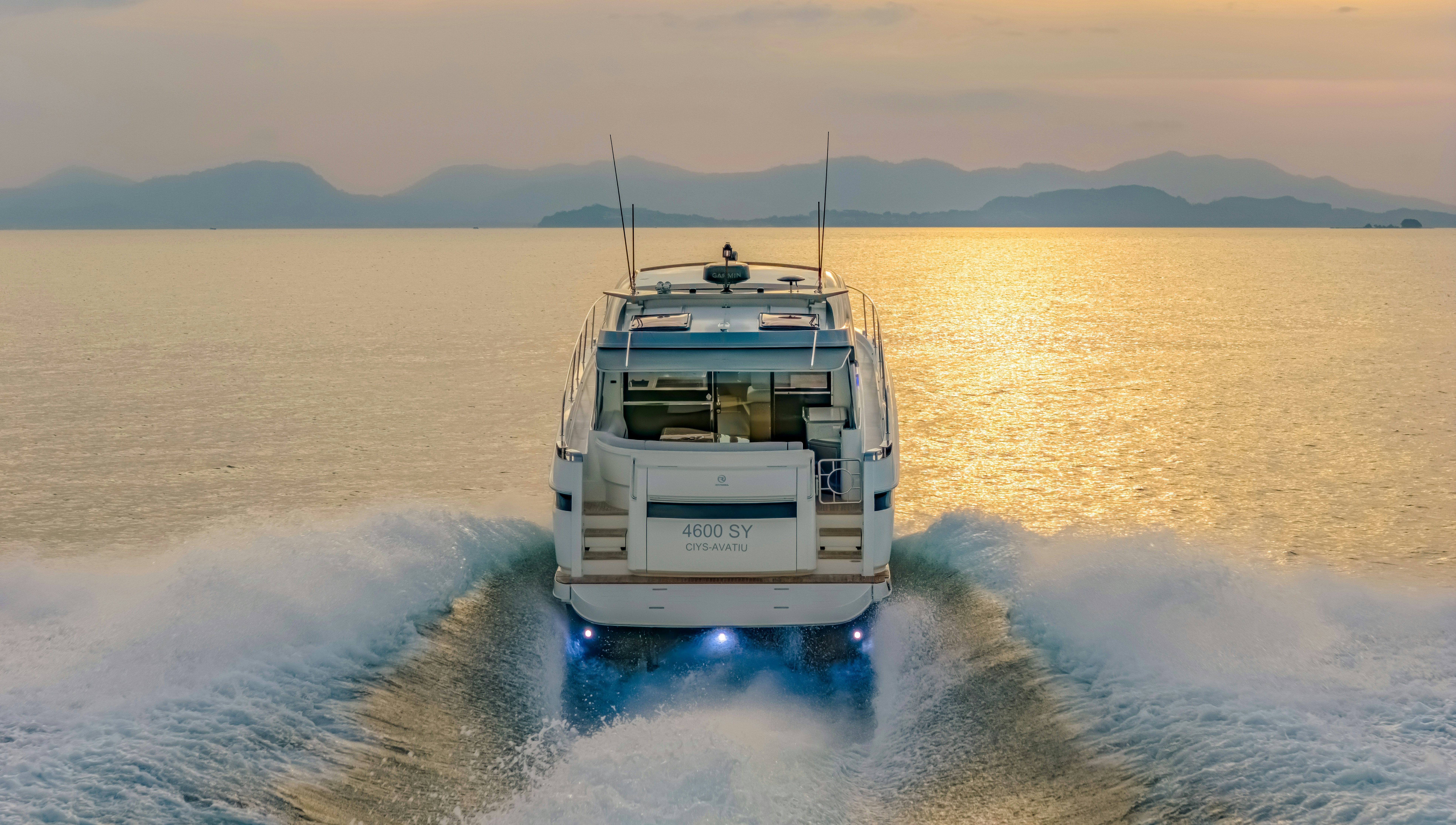 a boat on water aboard RIVIERA 4600 SPORT YACHT Yacht for Sale