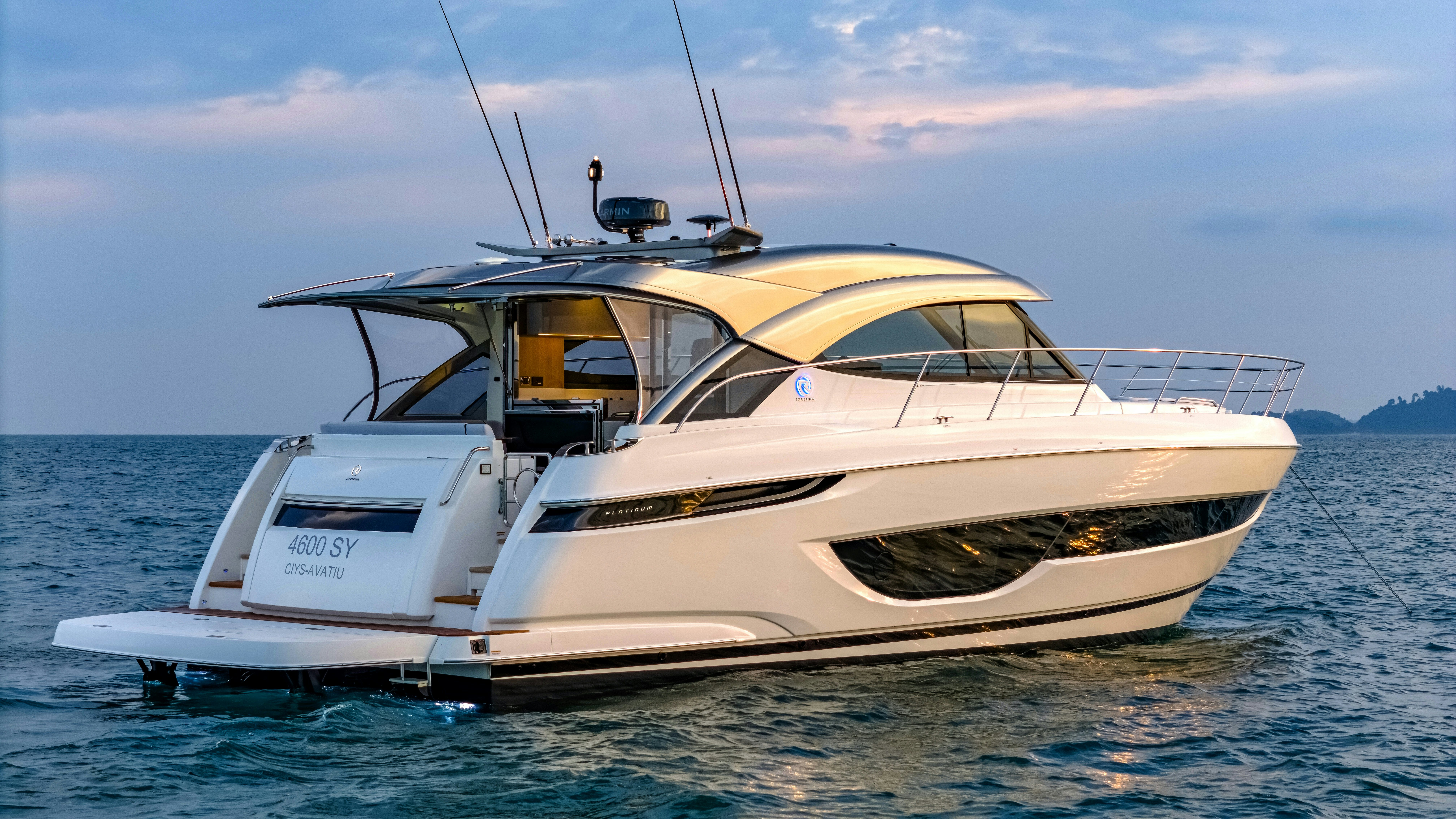 a boat on the water aboard RIVIERA 4600 SPORT YACHT Yacht for Sale