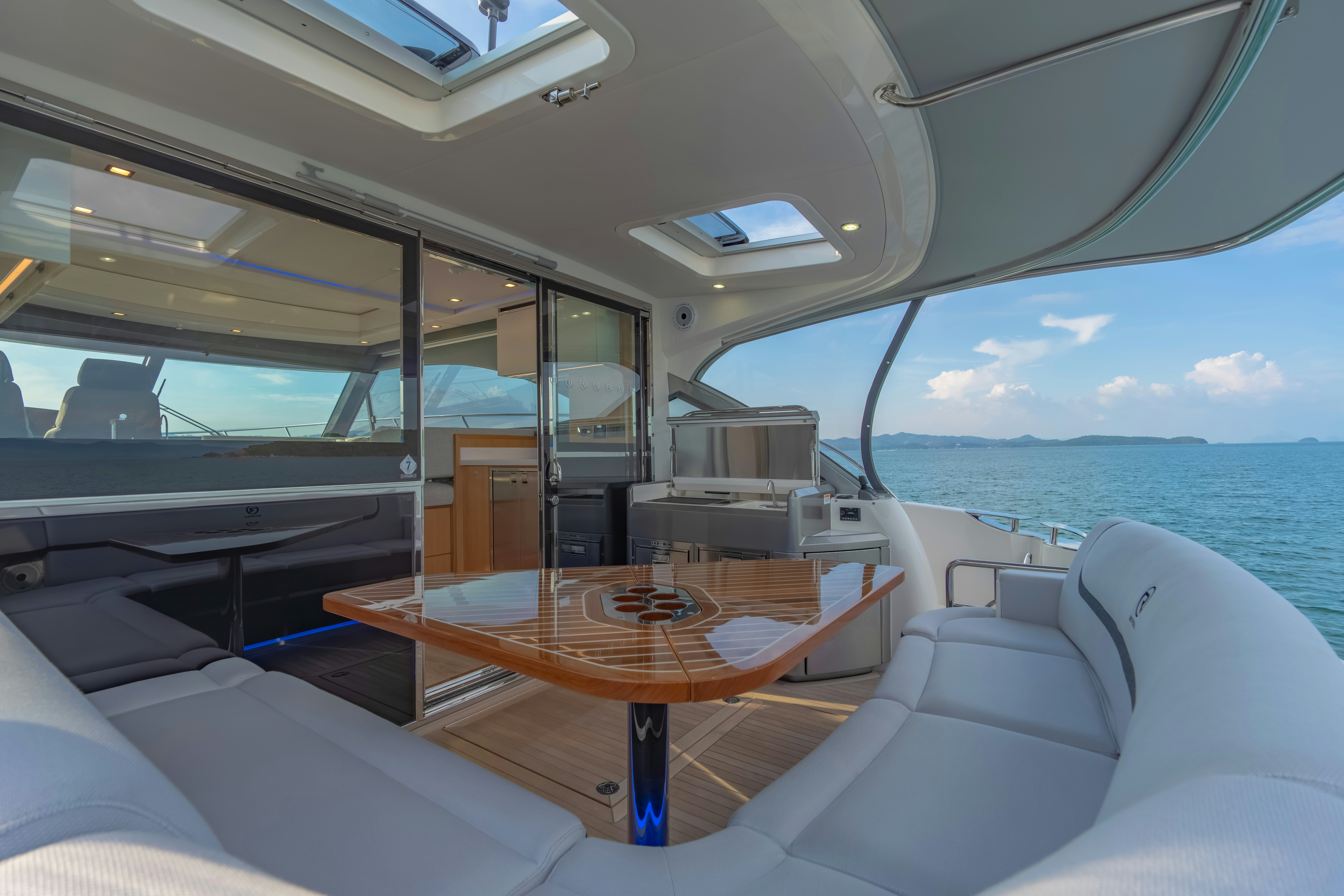 a table on a boat aboard RIVIERA 4600 SPORT YACHT Yacht for Sale