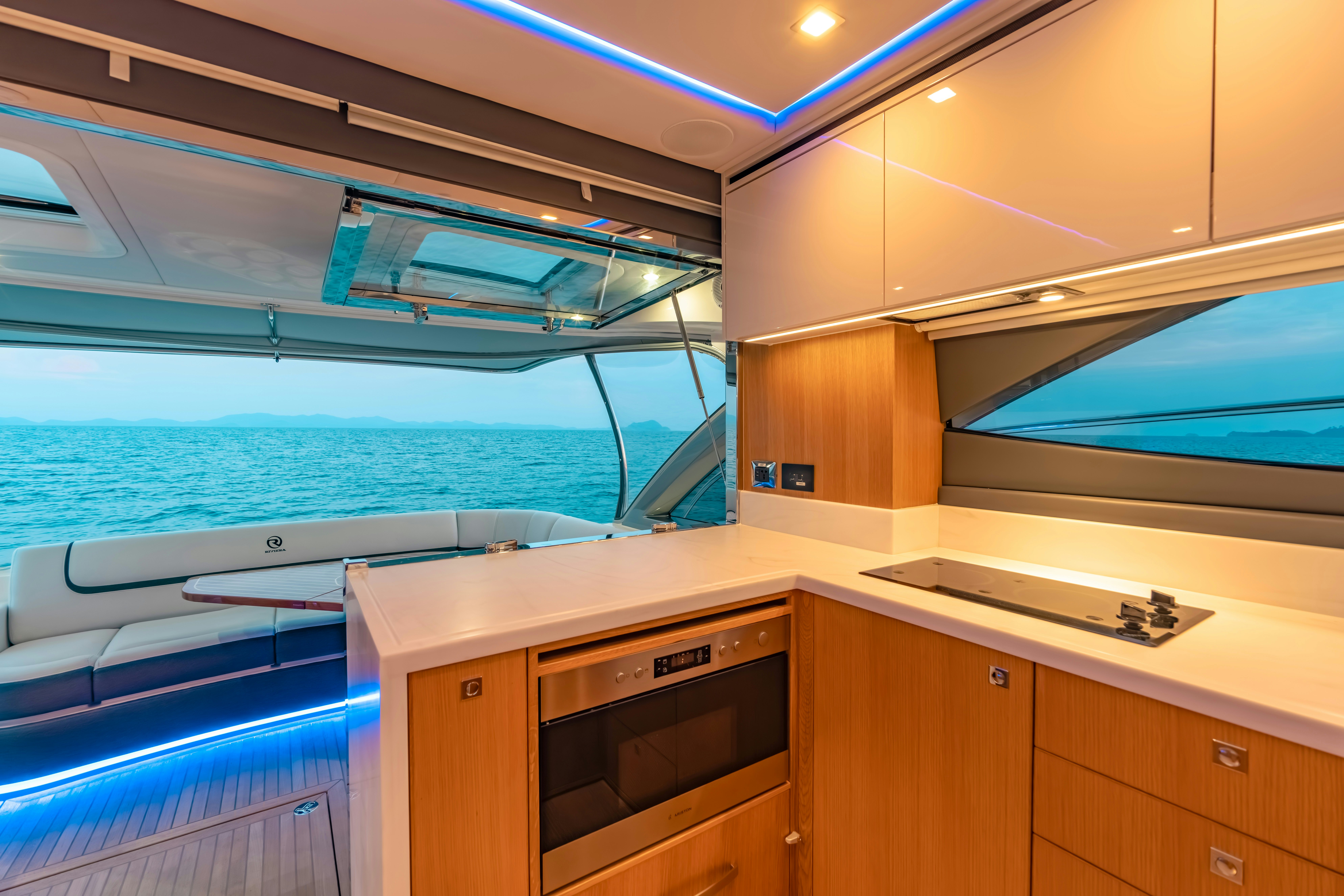 a kitchen with a view of the ocean aboard RIVIERA 4600 SPORT YACHT Yacht for Sale